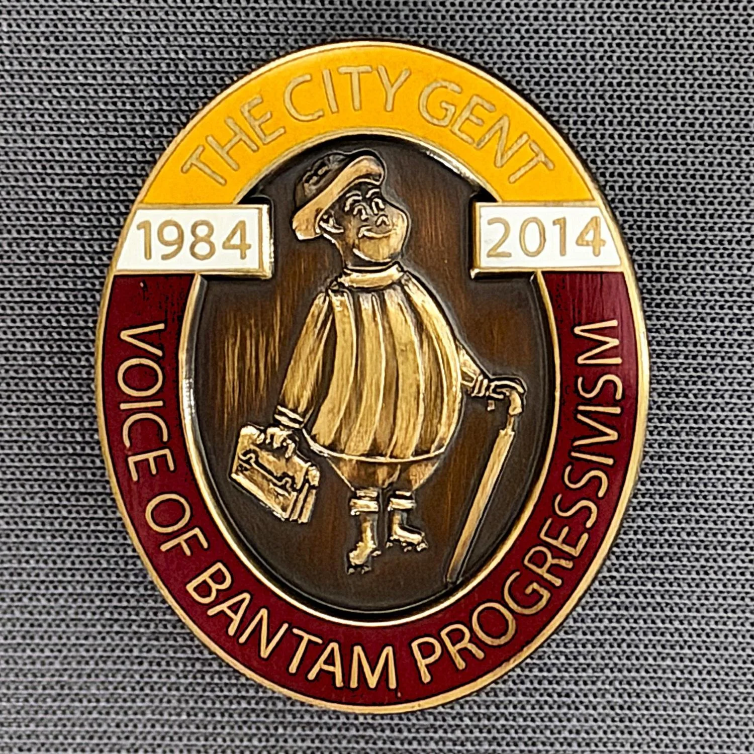 Reference Number: BCGEN051
Size: H 30 mm x W 24.8 mm
Pin Type: Brooch Pin
Plating: Antique Gold
Value: £8
Manufacturer: Unknown
Comments: City Gent Magazine 30 Year Badge