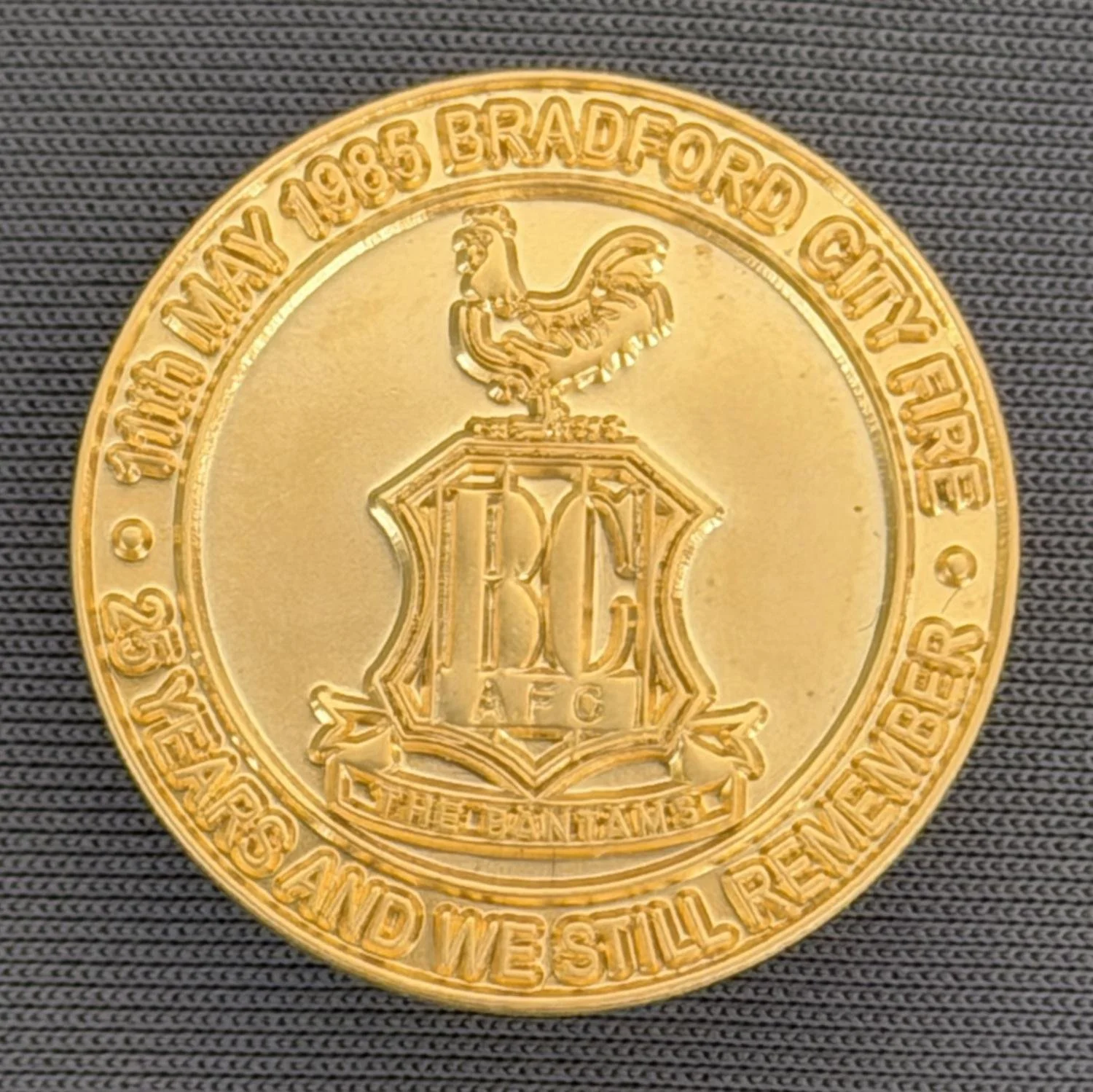 Reference Number: BCFIR008
Size: D 25 mm
Pin Type: Metal Clutch
Plating: Matt Gold
Value: £12
Manufacturer: Bradford City Badges
Comments: Limited Edition of 56 to raise additional money for Bradford Burns Unit.  Sold as set of 4.