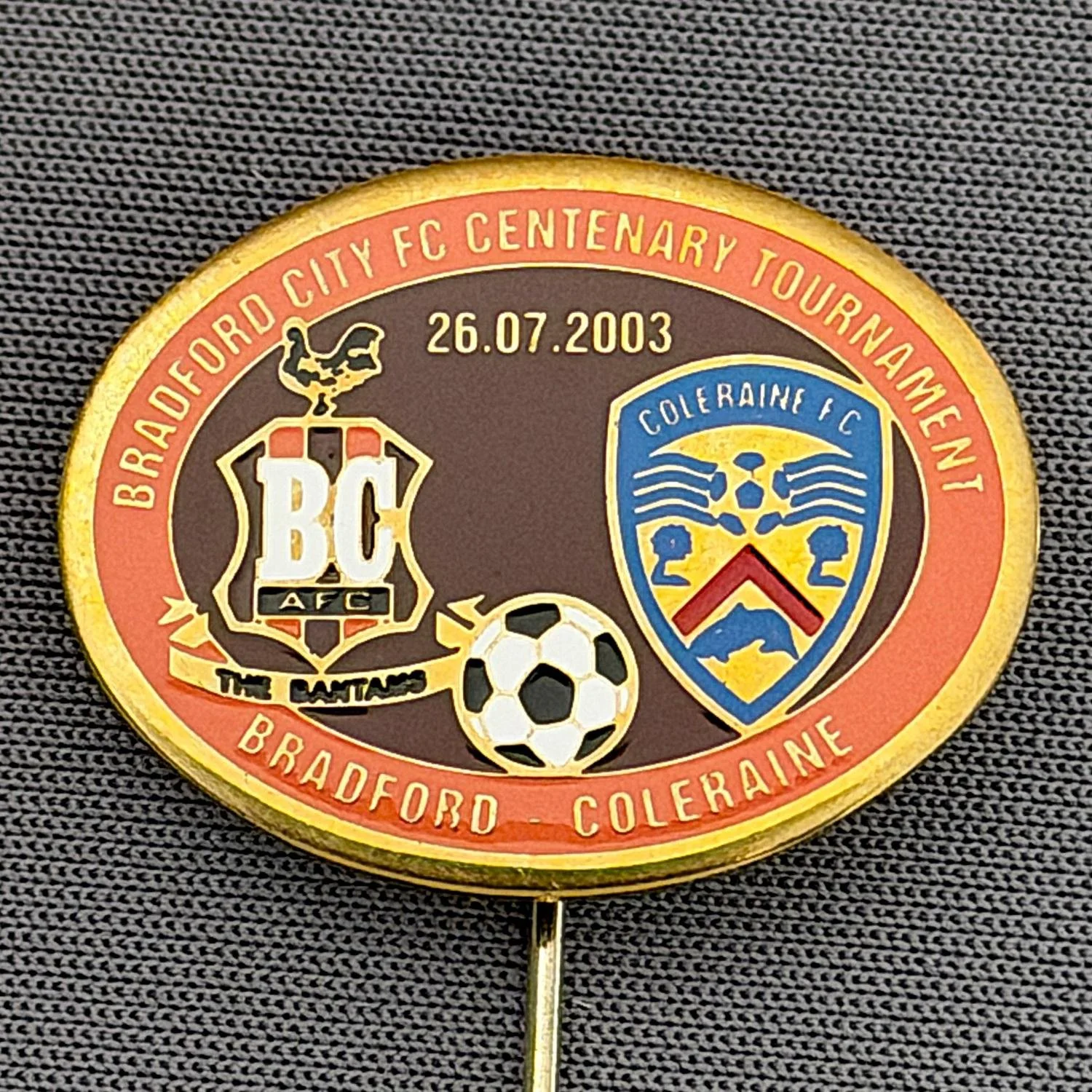 Reference Number: BCEVE021
Size: H 19.2 mm x W 24.9 mm
Pin Type: Stick Pin
Plating: Brass
Value: £12
Manufacturer: Russian
Comments: City v Coleraine, Centenary Tournament 2003, Amber & Claret