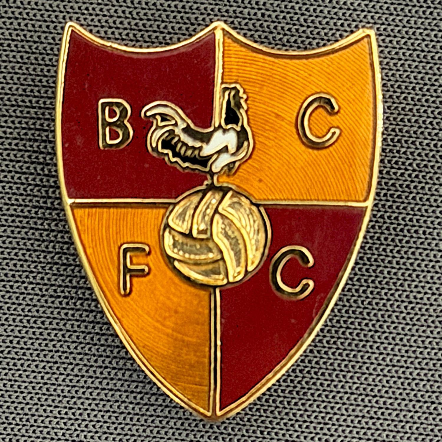 Reference Number: BCBCFC035
Size: H 21.9 mm x W 17.7 mm
Pin Type: Brooch Pin
Plating: Gold
Value: £8
Manufacturer: Unknown
Comments: BCFC Bantam Shield Claret & Amber