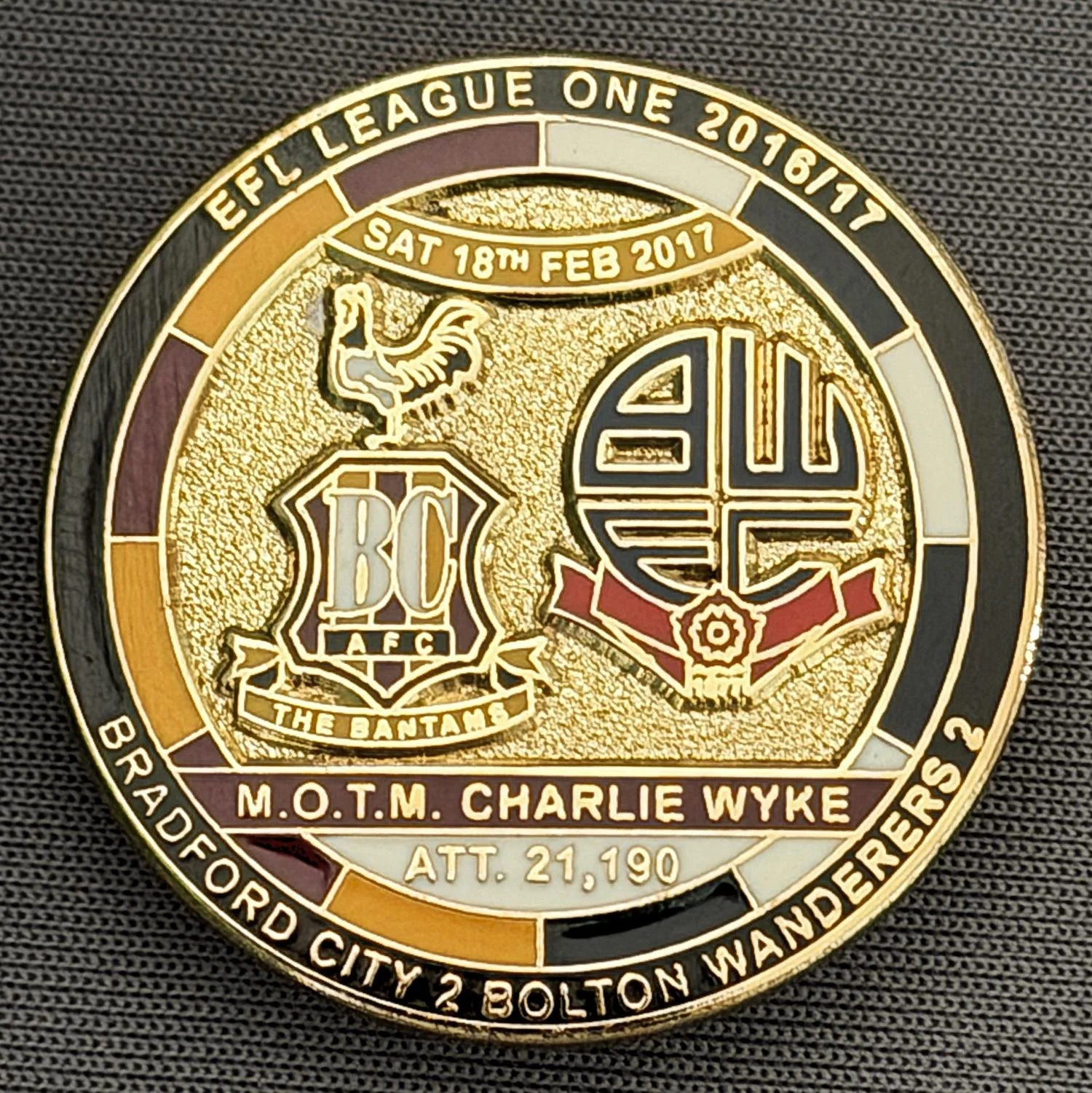 Reference Number: BCFIX385
Size: D 29.4 mm
Pin Type: Brooch Pin
Plating: Gold
Value: £8
Manufacturer: Bradford City Badges
Comments: Bradford City v Bolton Wanderers 2015/16, Limited Edition of 50 Badges (Gold Version)