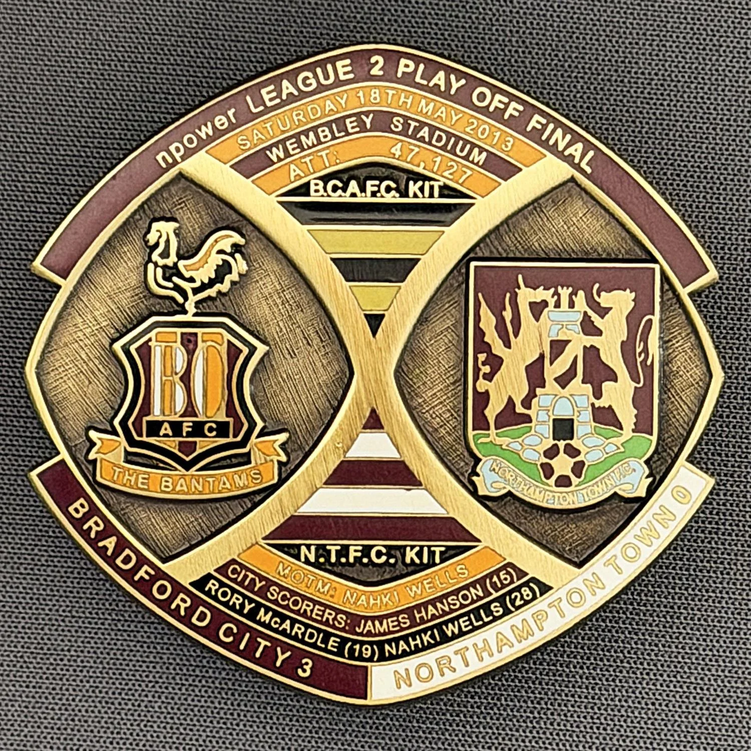 Reference Number: BCOFIX021
Size: H 40 mm x W 42.1 mm
Pin Type: Double Metal Clutch
Plating: Antique Bronze
Value: £10
Manufacturer: Bradford City Badges
Comments: Bradford City v Northampton League 2 Play Off Final 2013