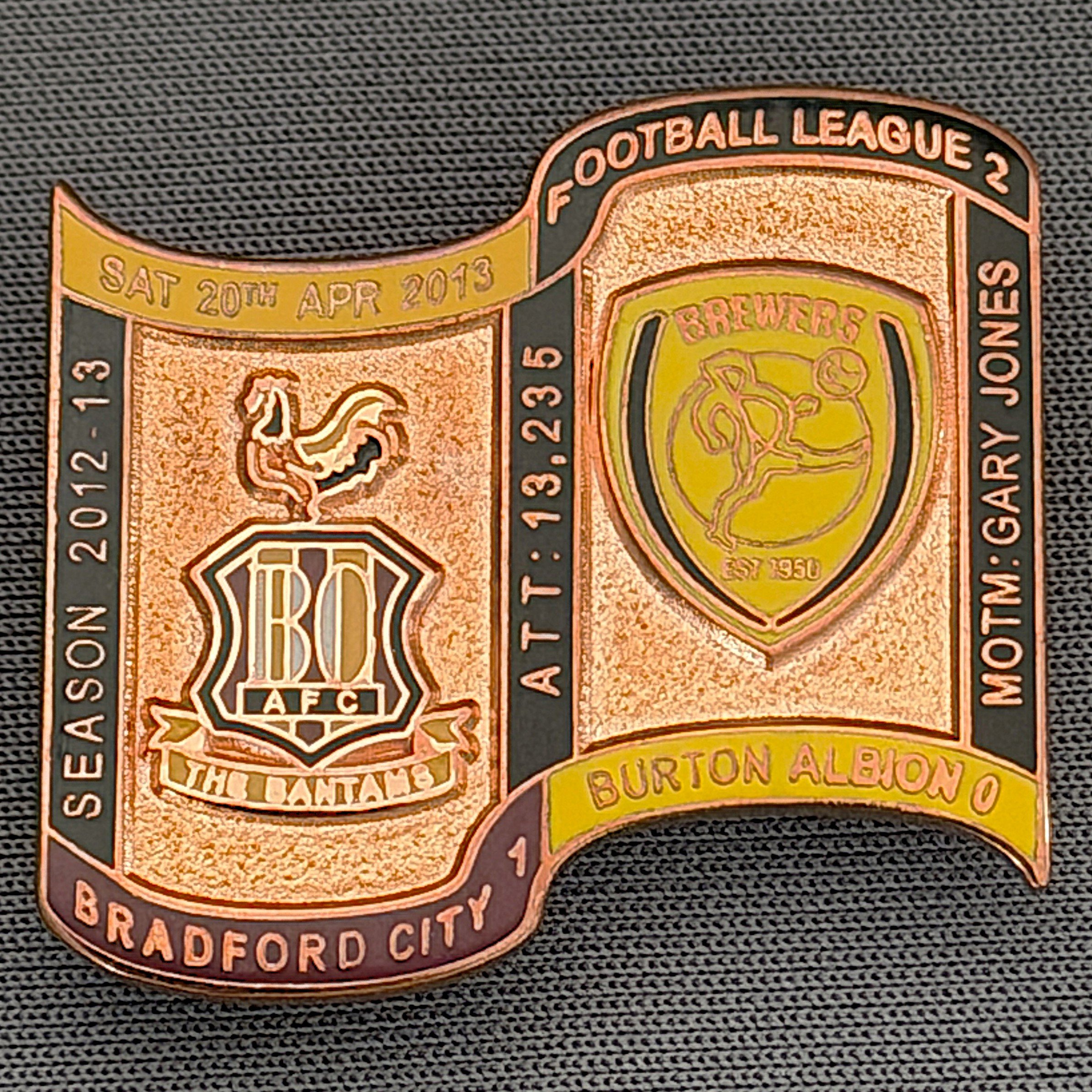 Reference Number: BCFIX183
Size: H 26.9 mm x W 29.2 mm
Pin Type: Brooch Pin
Plating: Copper
Value: £12
Manufacturer: Bradford City Badges
Comments: Bradford City v Burton Albion 2012/13 Limited Edition 1 Badge (Copper Version)
