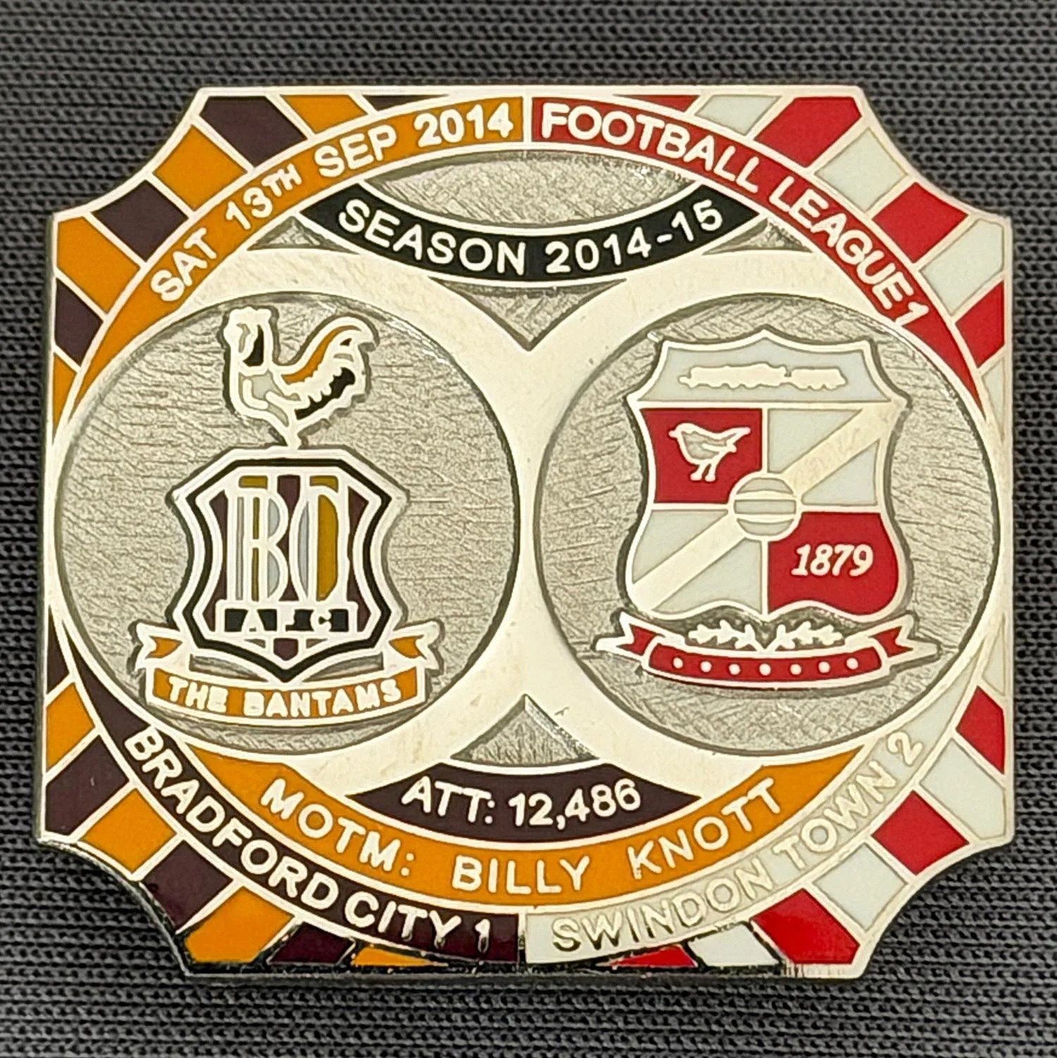 Reference Number: BCFIX280
Size: H 26.8 mm x W 28.8 mm
Pin Type: Brooch Pin
Plating: Nickel
Value: £10
Manufacturer: Bradford City Badges
Comments: Bradford City v Swindon Town 2014/15, Limited Edition of 10 Badges (Nickel Version)
