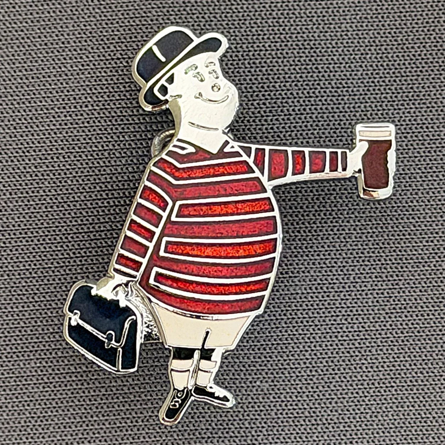 Reference Number: BCGEN073
Size: H 28.8 mm x W 20.9 mm
Pin Type: Brooch Pin
Plating: Silver
Value: £20
Manufacturer: Bradford City Badges
Comments: City Gent Beer Cloisonne, Black Briefcase. One Off Badge.