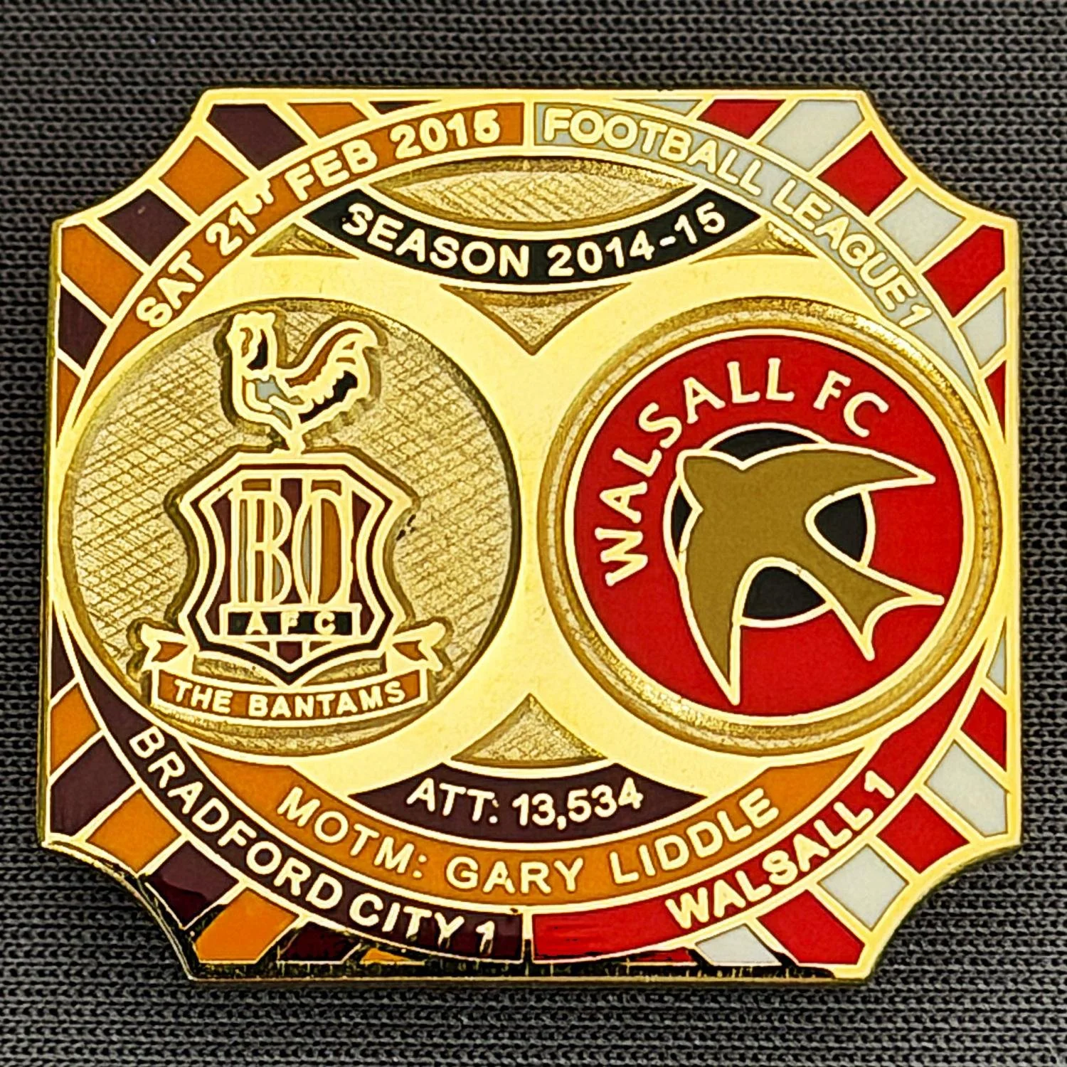 Reference Number: BCFIX269
Size: H 26.8 mm x W 28.8 mm
Pin Type: Brooch Pin
Plating: Gold
Value: £8
Manufacturer: Bradford City Badges
Comments: Bradford City v Walsall 2014/15,  Limited Edition of 50 Badges (Gold Version)