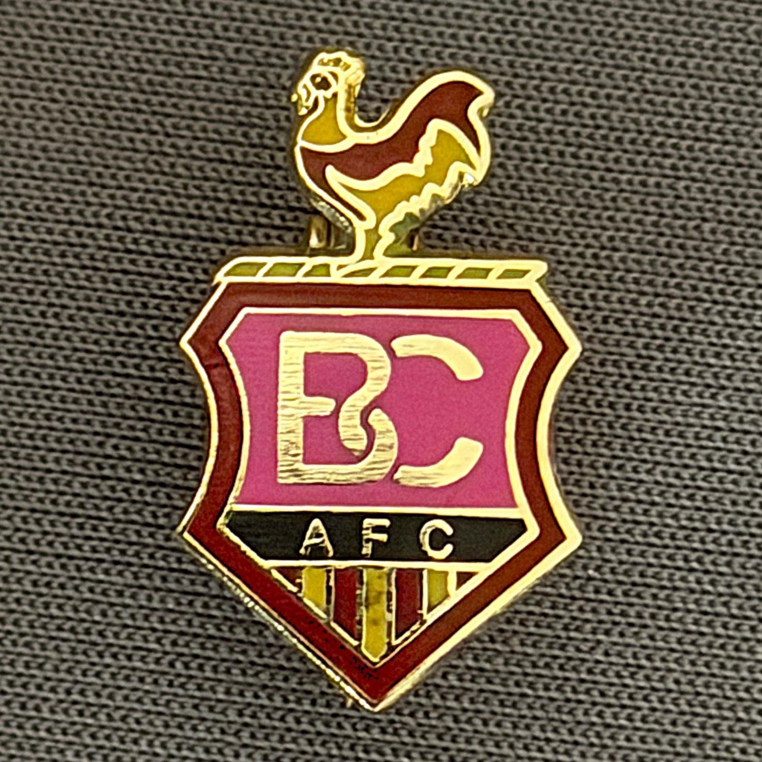 Reference Number: BCC&L109
Size: H 18.3 mm x W 11.1 mm
Pin Type: Brooch Pin
Plating: Gold
Value: £6
Manufacturer: Unknown
Comments: BCAFC Crest Pink Version
