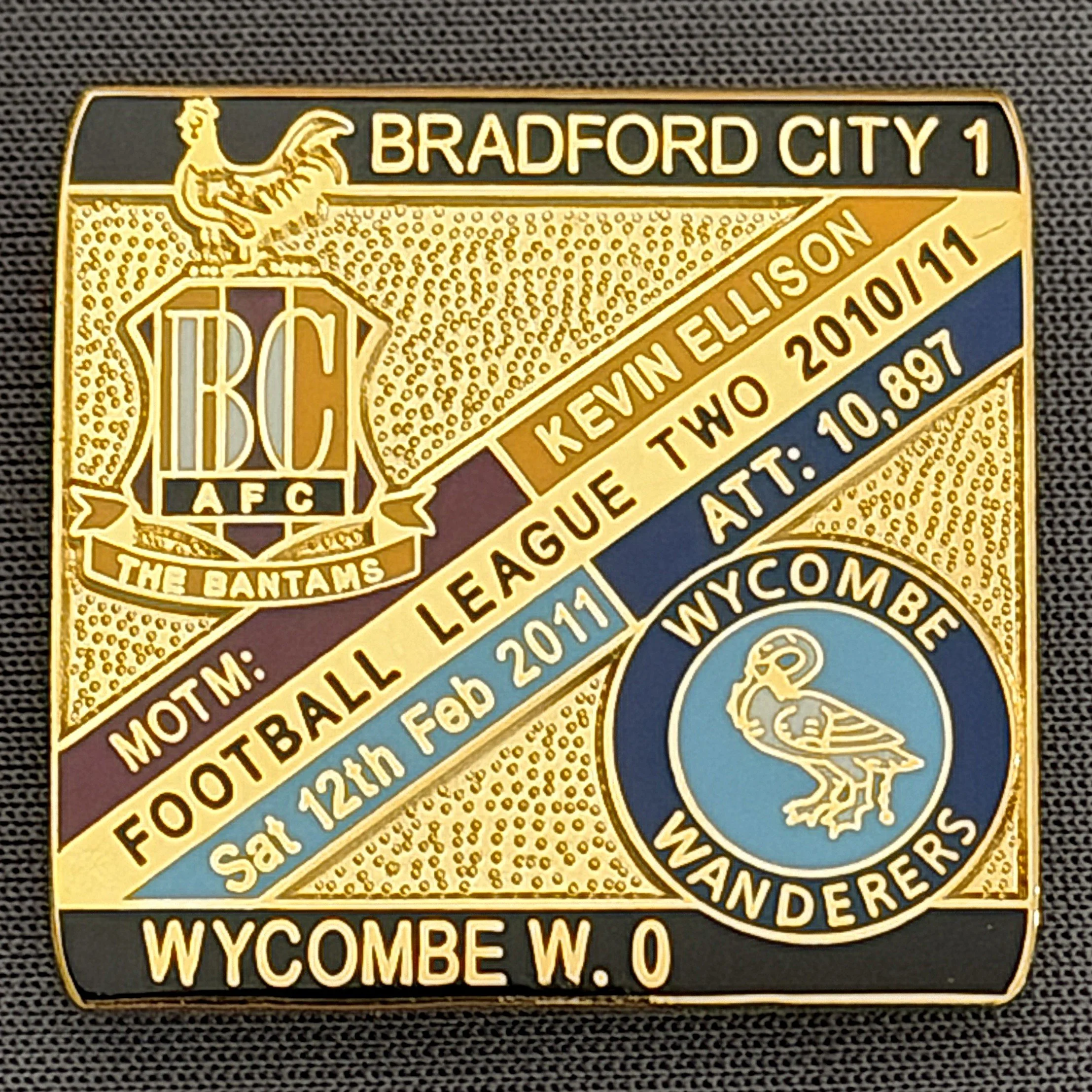 Reference Number: BCFIX060
Size: H 28.3 mm x W 29.3 mm
Pin Type: Brooch Pin
Plating: Gold
Value: £8
Manufacturer: Bradford City Badges
Comments: Bradford City v Wycombe Wanderers 2010/11 Limited Edition 100 Badges