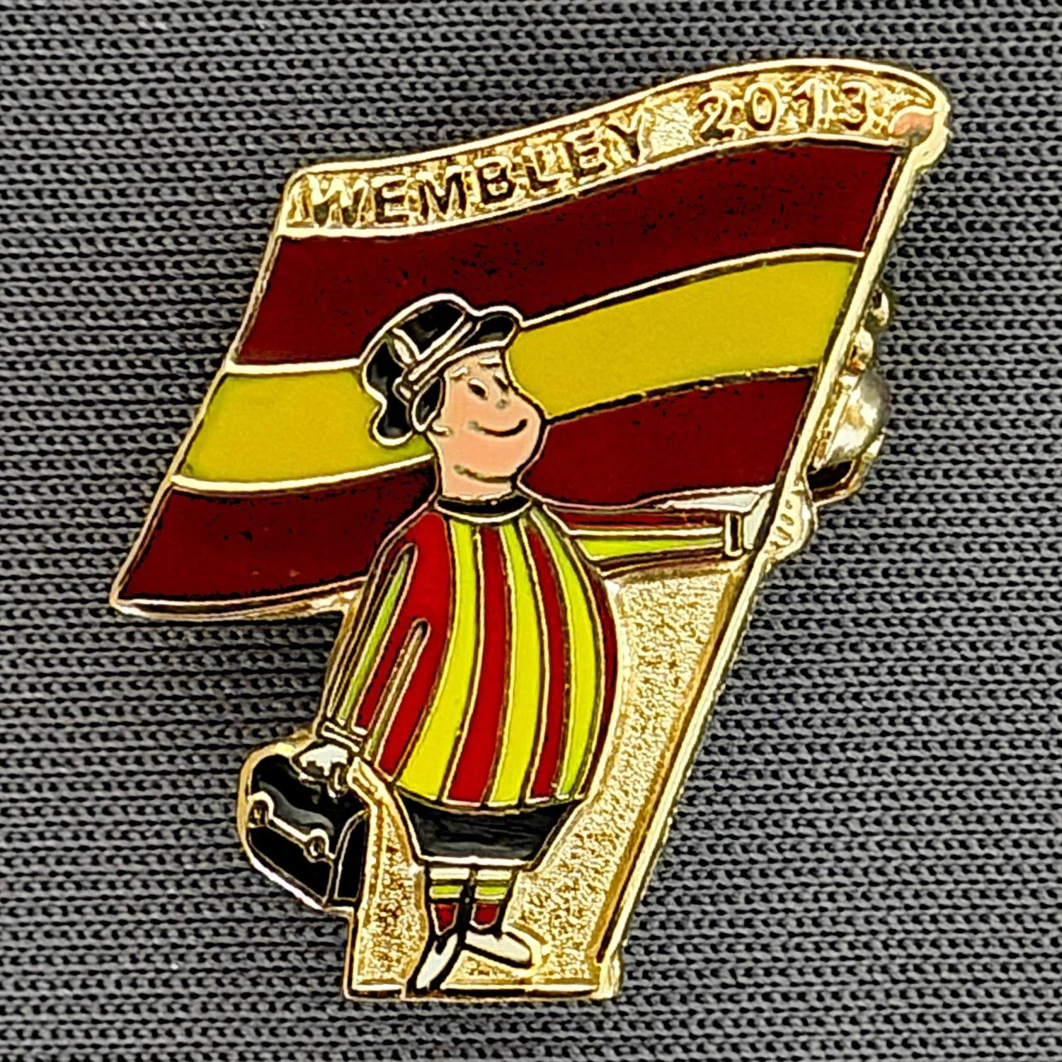 Reference Number: BCGEN50
Size: H 22.2 mm x W 14 mm
Pin Type: Brooch Pin
Plating: Gold
Value: £8
Manufacturer: Unknown
Comments: City Gent Wembley 2013 Flag
