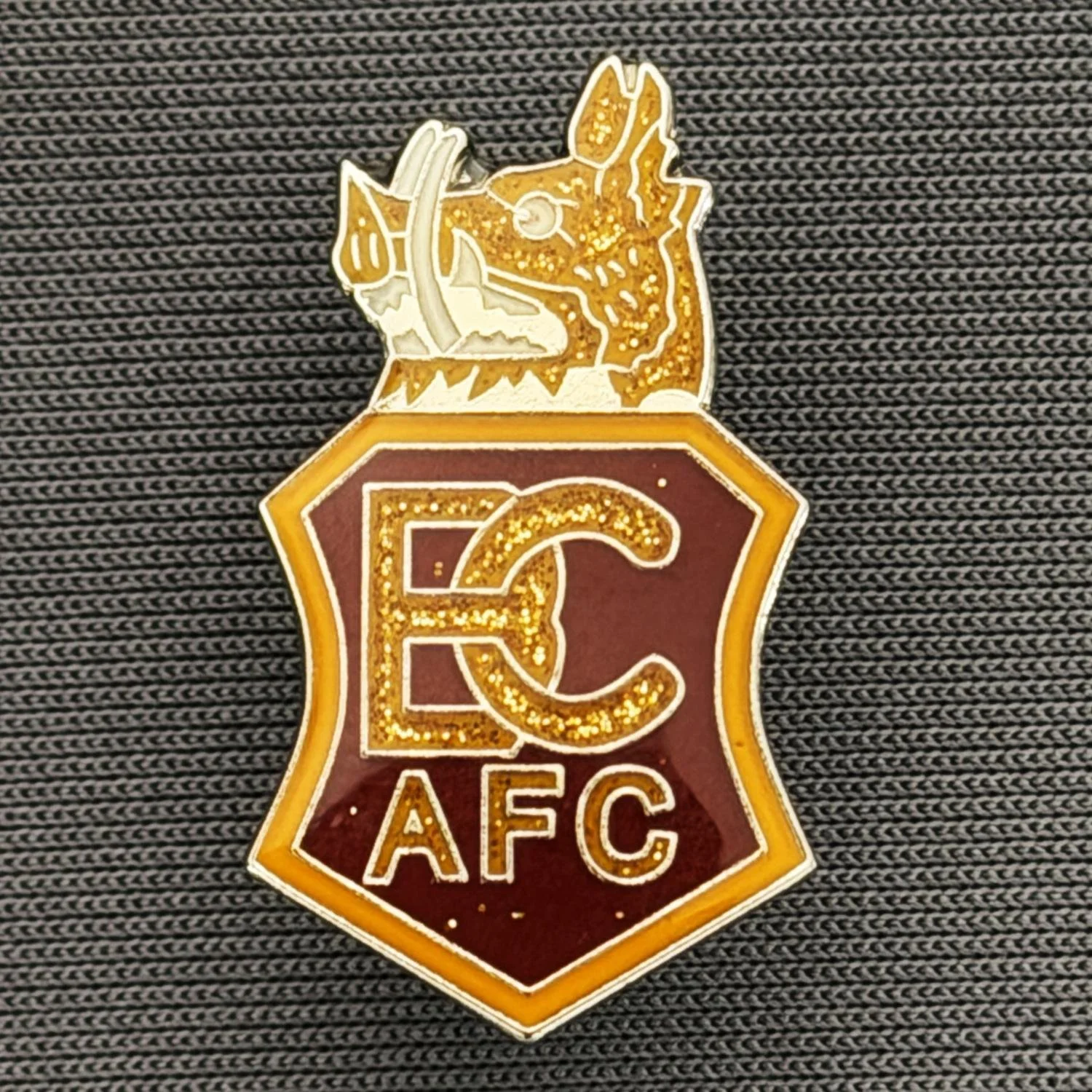 Reference Number: BCBOH084
Size: H 25 mm x W 14.5 mm
Pin Type: Brooch Pin
Plating: Silver
Value: £8
Manufacturer: Official Bradford City Shop
Comments:  Sparkly Boar's Head Claret & Amber