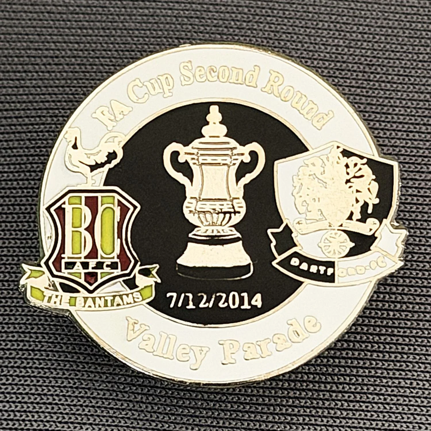 Reference Number: BCFAC070
Size: H 23.3 mm x W 25.6 mm
Pin Type: Metal Clutch
Plating: Silver
Value: £4
Manufacturer: Dan Lloyd
Comments: F.A. Cup Second Round 2014/15, v Dartford, White & Black Version