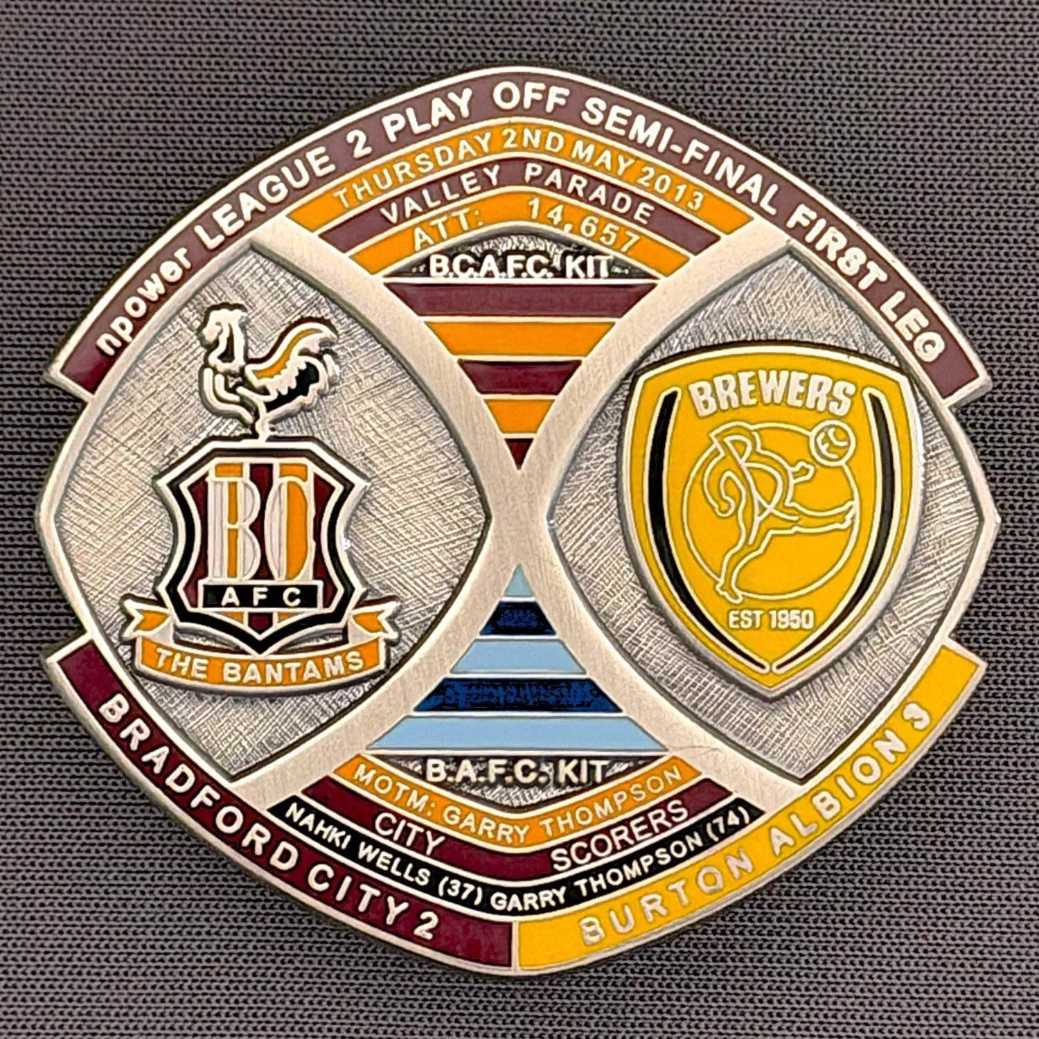 Reference Number: BCOFIX016
Size: H 40 mm x W 42.1 mm
Pin Type: Brooch Pin
Plating: Antique Silver
Value: £15
Manufacturer: Bradford City Badges
Comments: League 2 Semi Final Play Off 1st Leg v Burton Albion 2013, Limited Edition 1