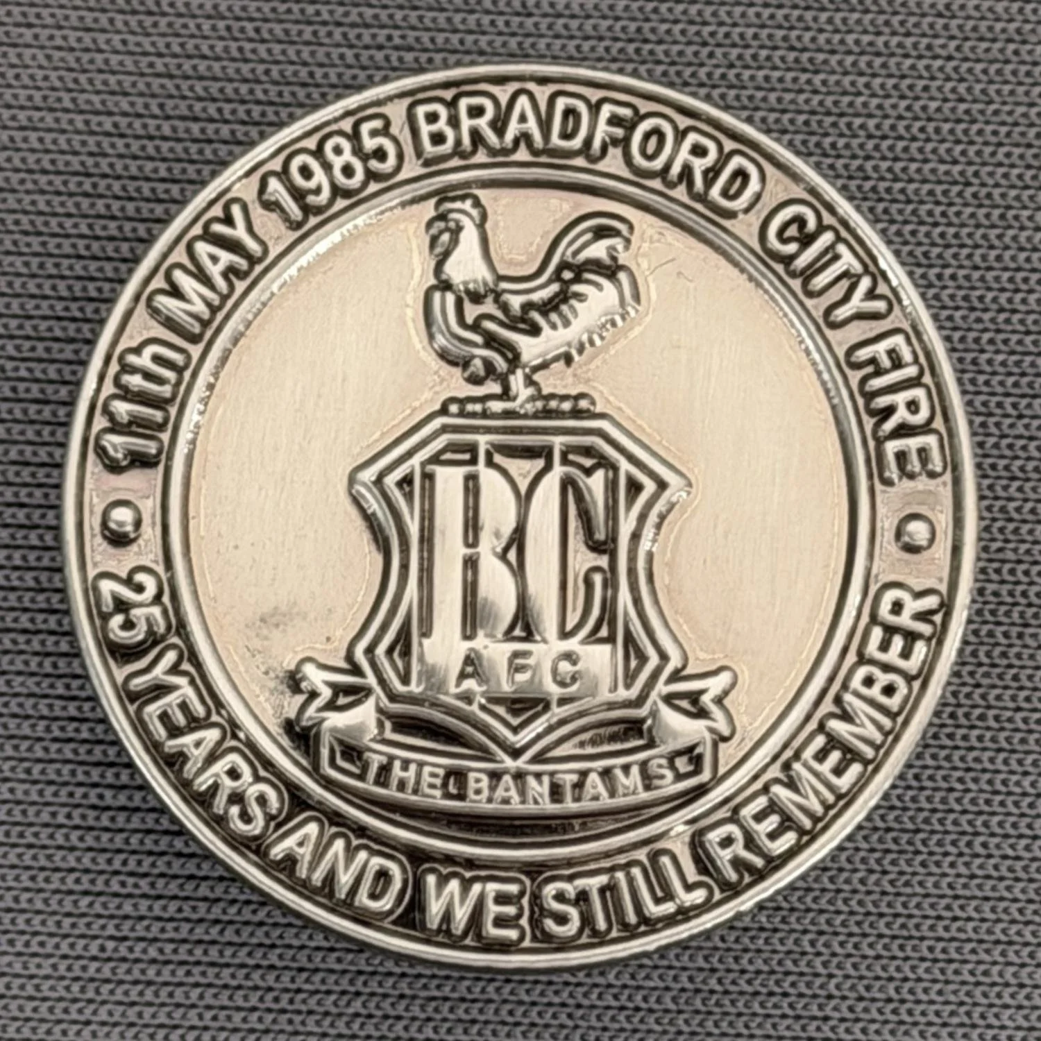 Reference Number: BCFIR008
Size: D 25 mm
Pin Type: Metal Clutch
Plating: Antique Silver
Value: £12
Manufacturer: Bradford City Badges
Comments: Limited Edition of 56 to raise additional money for Bradford Burns Unit.  Sold as set of 4.
