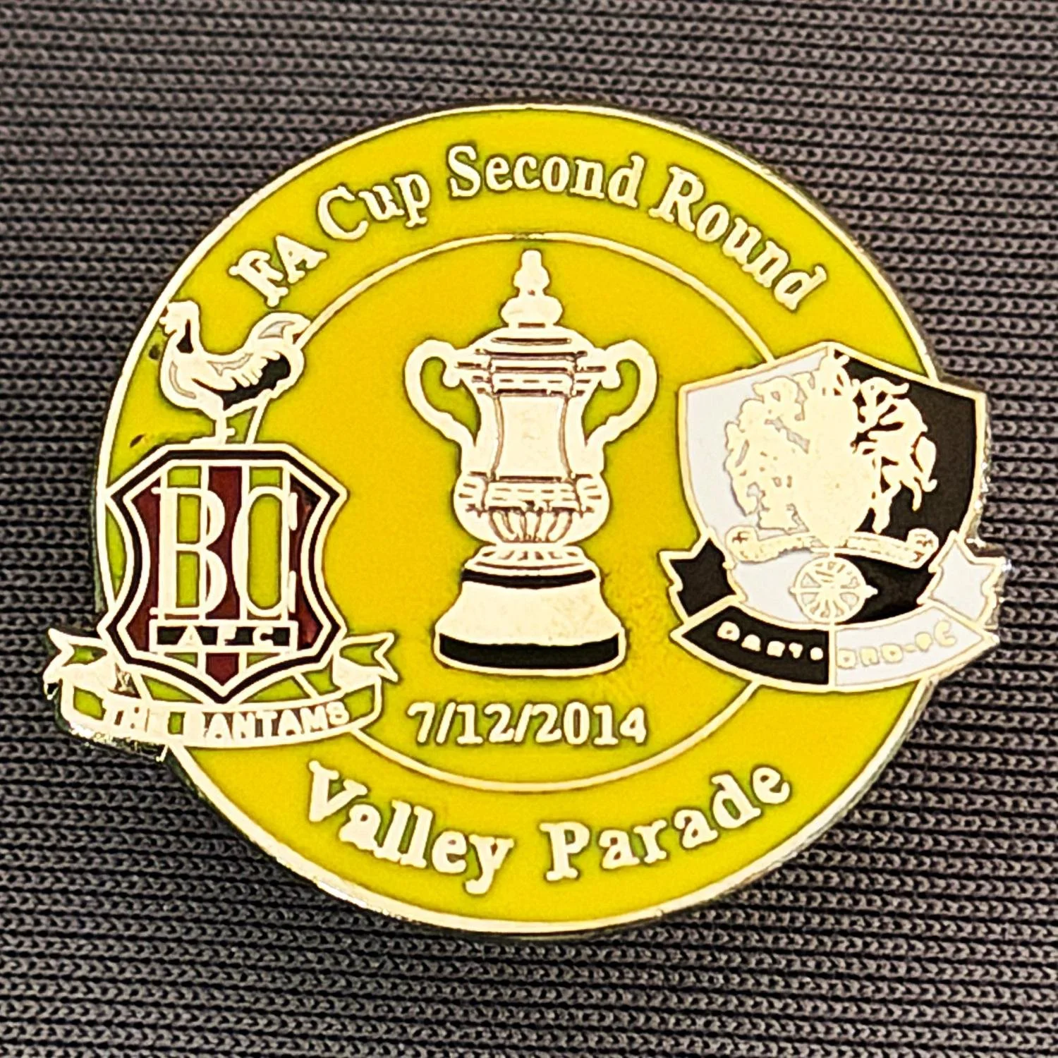Reference Number: BCFAC065
Size: H 23.3 mm x W 25.6 mm
Pin Type: Metal Clutch
Plating: Silver
Value: £4
Manufacturer: Dan Lloyd
Comments: F.A. Cup Second Round 2014/15, v Dartford, Amber Version