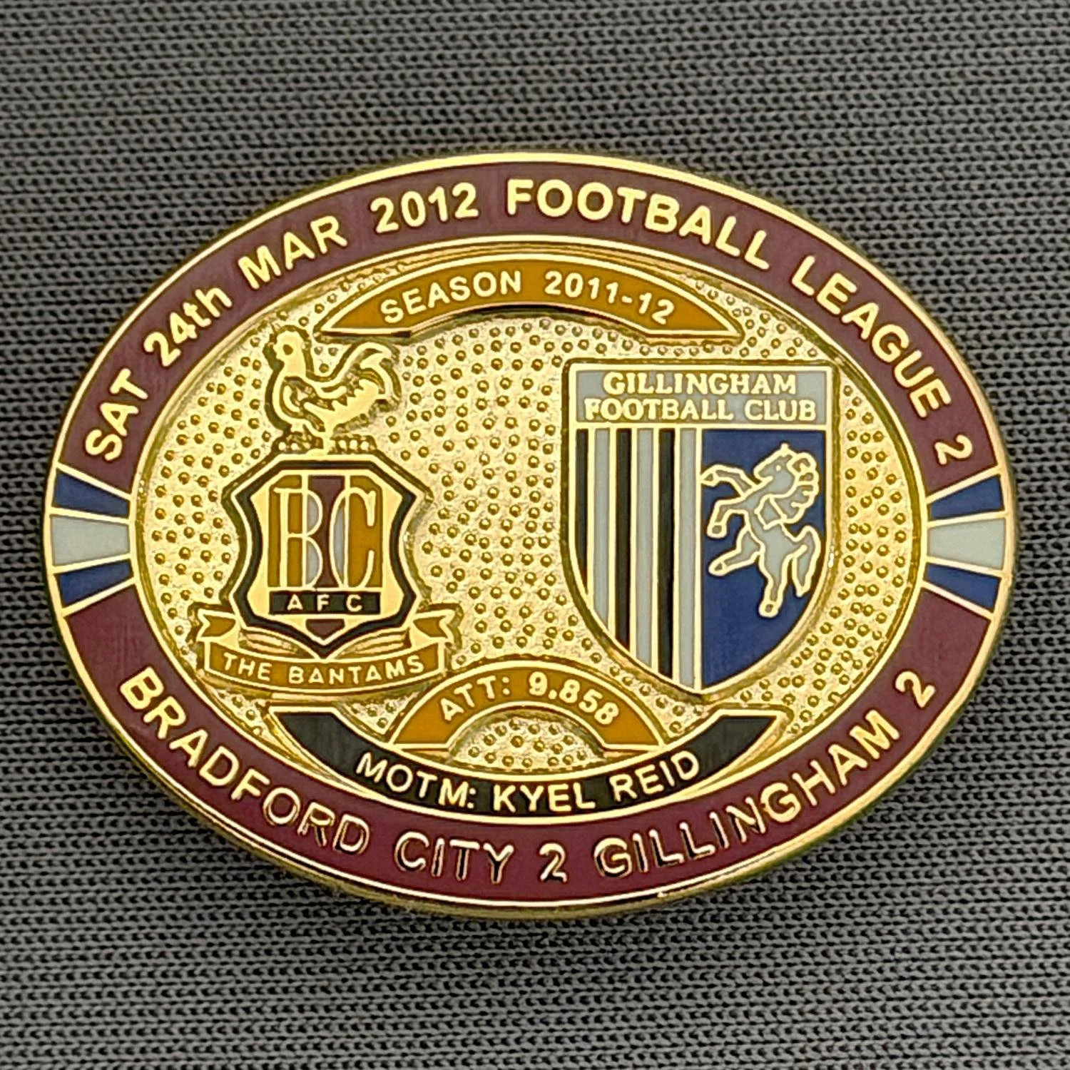 Reference Number: BCFIX088
Size: H 23.6 mm x W 28.7 mm
Pin Type: Brooch Pin
Plating: Gold
Value: £8
Manufacturer: Bradford City Badges
Comments: Bradford City v Gillingham  2011/12 Limited Edition 80 Badges
