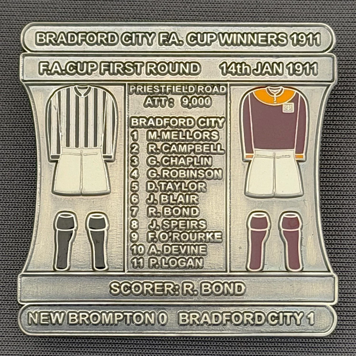 Reference Number: BCFAC003
Size: H 41.8 mm x W 42.2 mm
Pin Type: Double Metal Clutch
Plating: Antique Silver
Value: £12
Manufacturer: Bradford City Badges
Comments: 1911 F.A. Cup First Round Away v New Brompton, Limited Edition of 30
