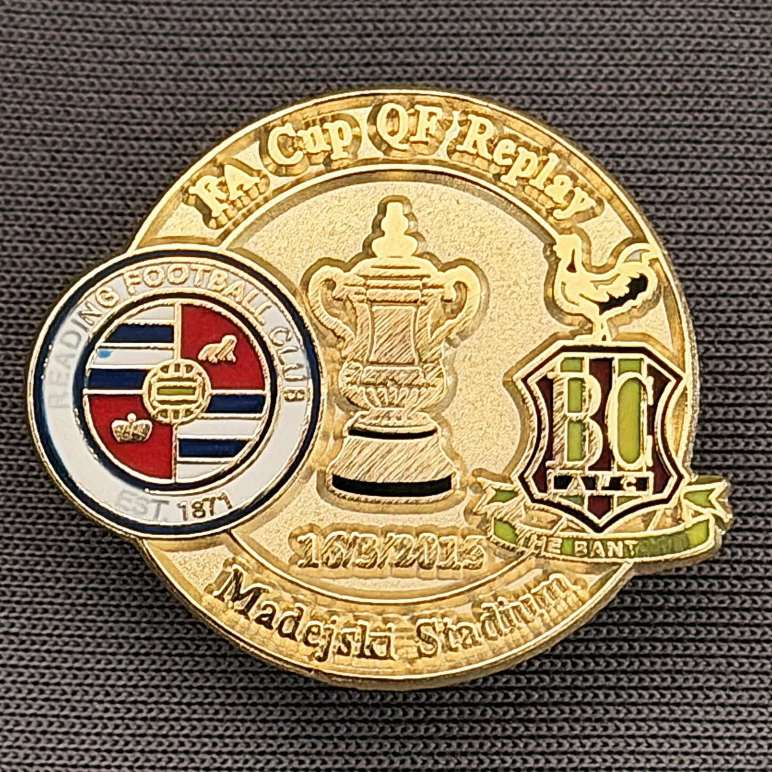 Reference Number: BCFAC133
Size: H 21.9 mm x W 26 mm
Pin Type: Metal Clutch
Plating: Gold
Value: £4
Manufacturer: Dan Lloyd
Comments: F.A. Cup Quarter Final Replay 2014/15, Away v Reading, Gold Version