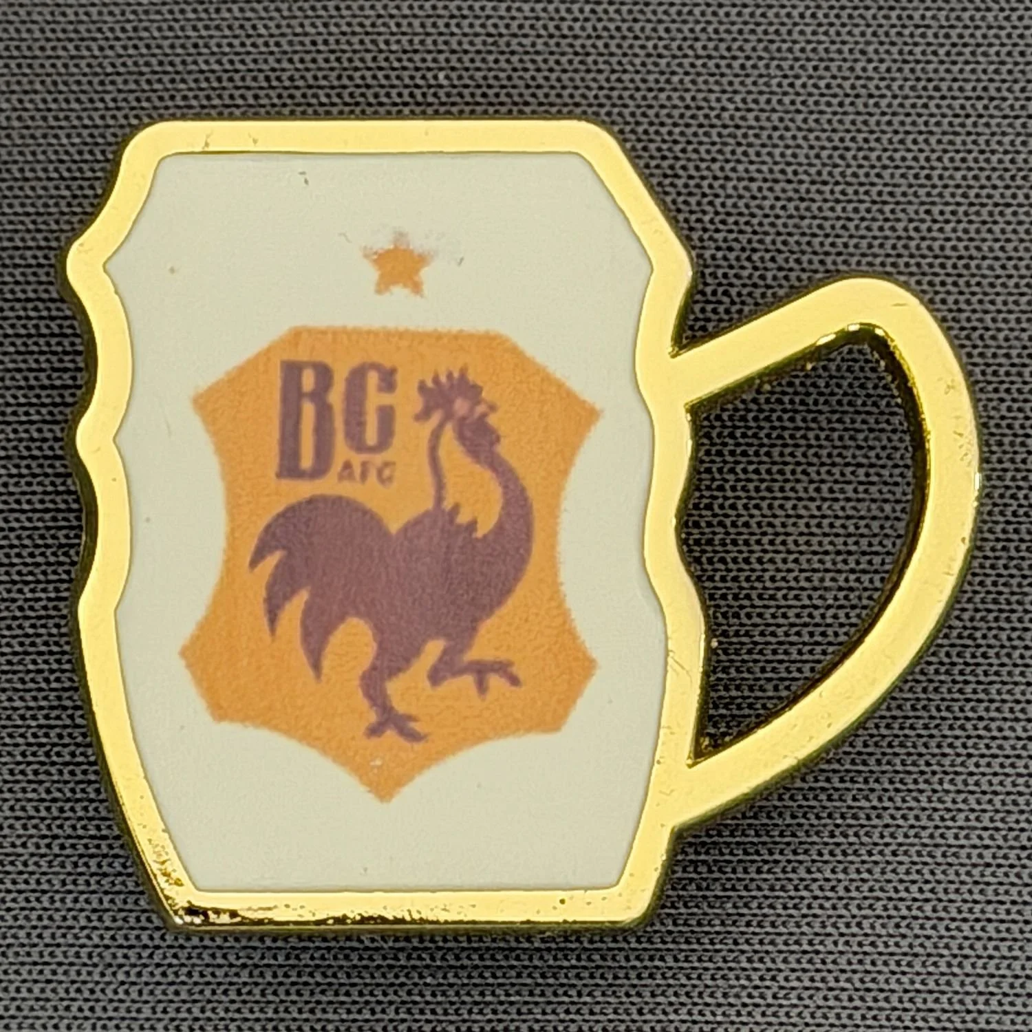 Reference Number: BCC&L170
Size: H 27.2 mm x 30.4 mm
Pin Type: Metal Clutch
Plating: gold
Value: £6
Manufacturer: ArtGraph
Comments: City Logo Tankard