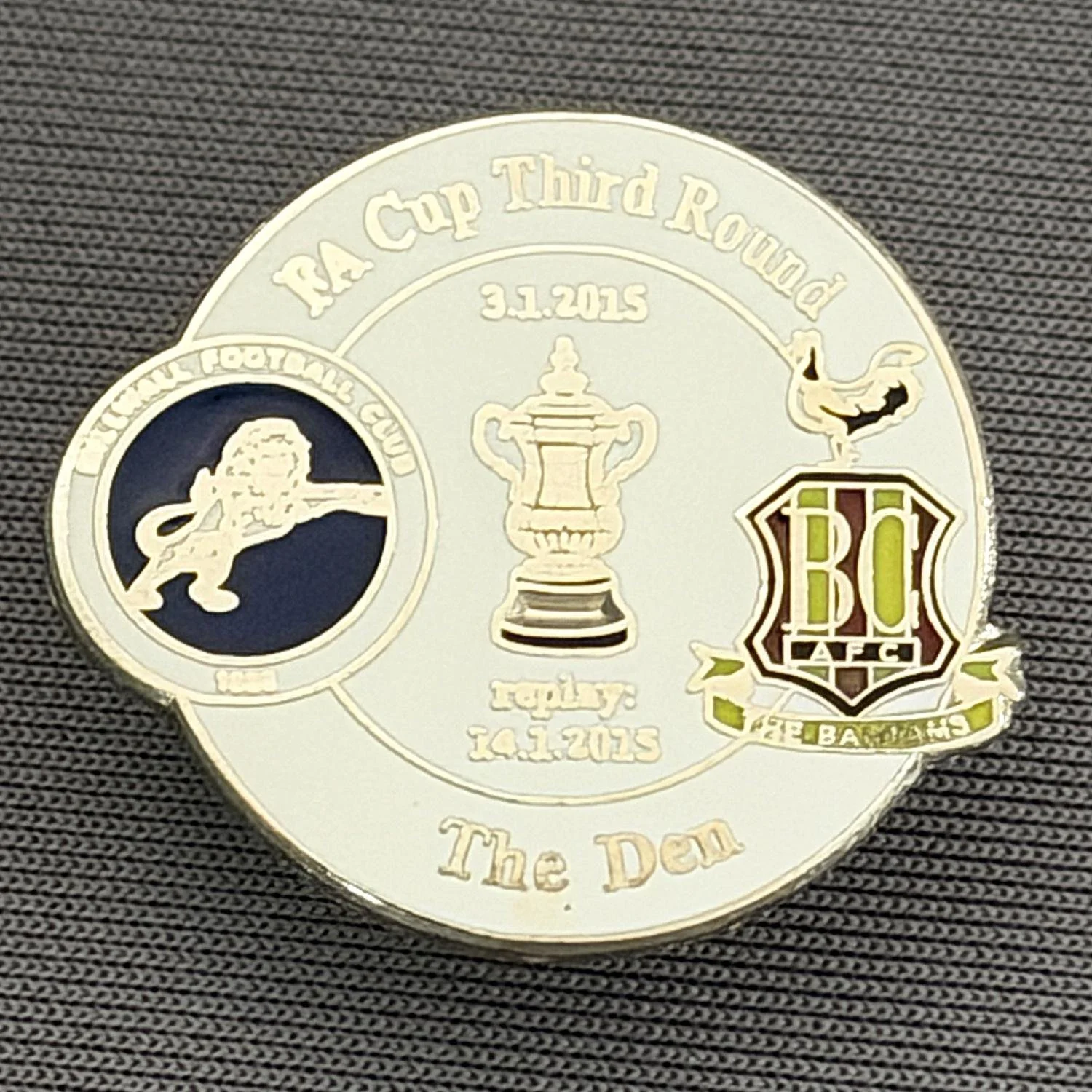 Reference Number: BCFAC081
Size: H 22.7 mm x W 26 mm
Pin Type: Metal Clutch
Plating: Silver
Value: £4
Manufacturer: Dan Lloyd
Comments: F.A. Cup Third Round 2014/15, Away v Millwall, White Version