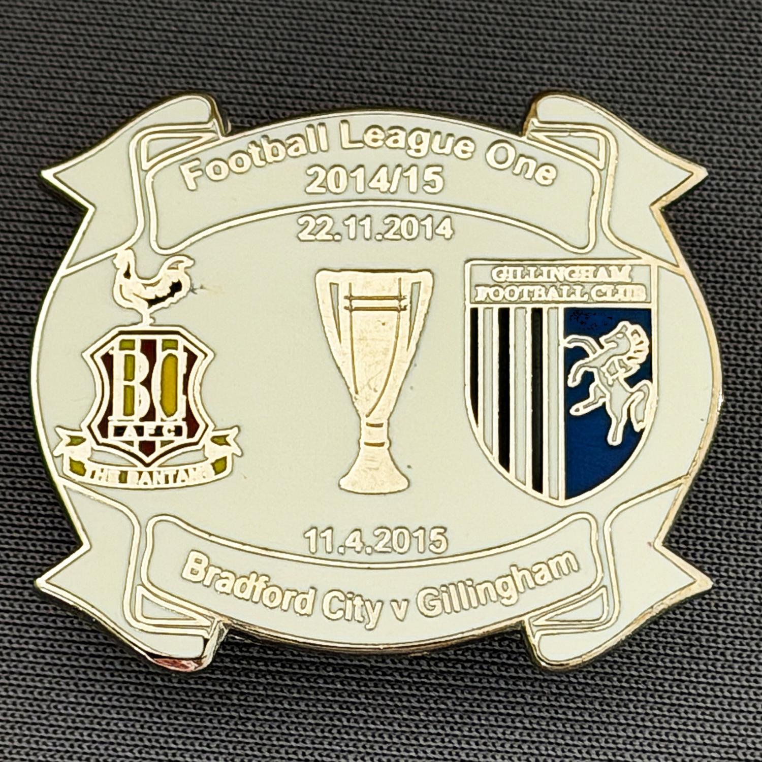Reference Number: BCOFIX150
Size: H 28 mm x W 32.7 mm
Pin Type: Metal Clutch
Plating: Silver
Value: £6
Manufacturer: Unknown
Comments: Bradford City v Gillingham League One 2014/15 Limited Edition 5
