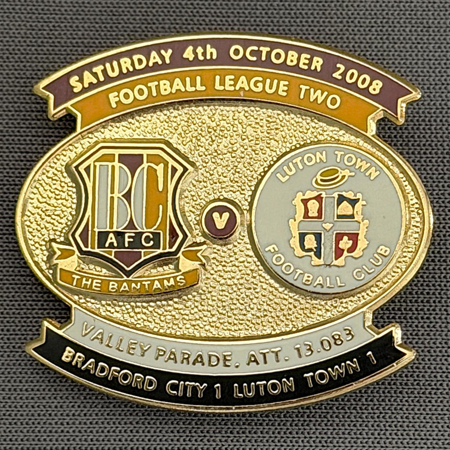 Reference Number: BCFIX005
Size: H 26.6 mm x W 29 mm
Pin Type: Brooch Pin
Plating: Gold
Value: £8
Manufacturer: Bradford City Badges
Comments: Bradford City v Luton Town 2008/09 Limited Edition 100 Badges

