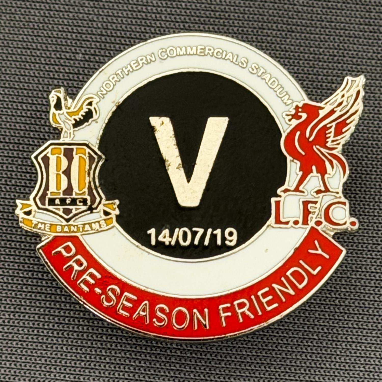 Reference Number: BCOFIX159
Size: H 25 mm x W 28.4 mm
Pin Type: Metal Clutch
Plating: Silver
Value: £5
Manufacturer: Unknown
Comments: Bradford City v Liverpool Pre Season Friendly 2019, Red, White & Black Version