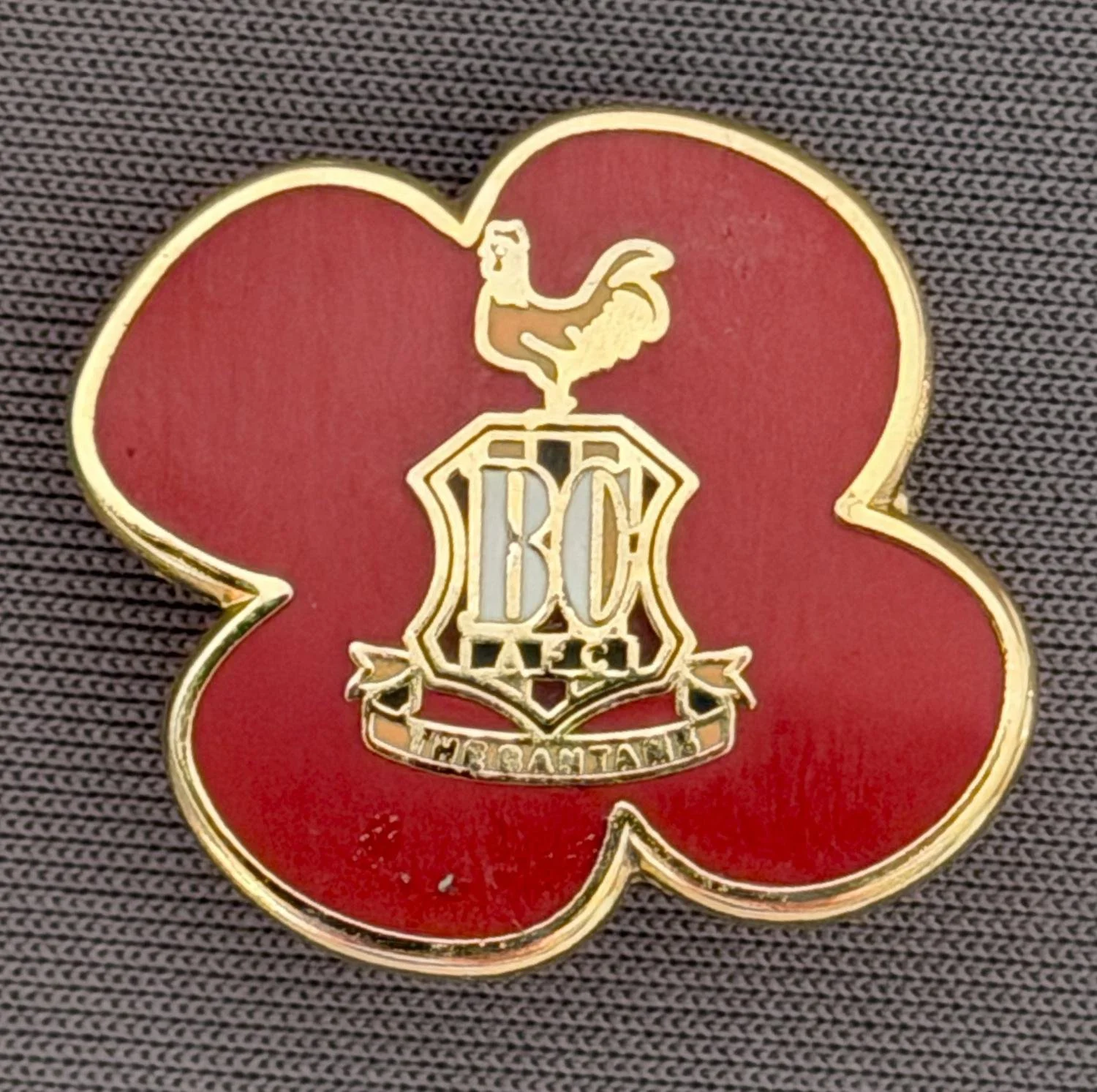 Reference Number: BCC&L047
Size: H 21 mm x 23.2 mm
Pin Type: Brooch Pin
Plating: Gold
Value: £8
Manufacturer: Unknown
Comments: Claret 4 Leaved Bradford City Clover Logo