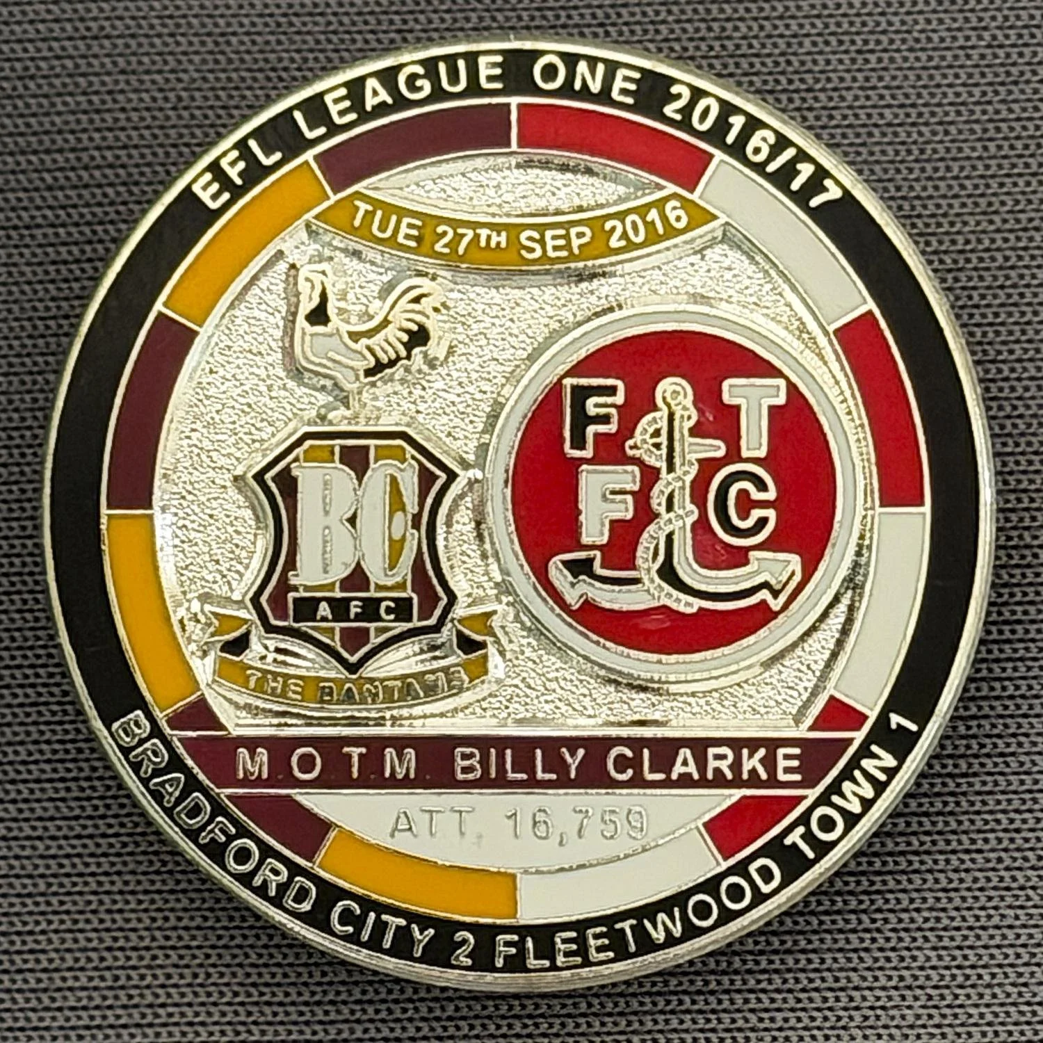 Reference Number: BCFIX396
Size: D 29.4 mm
Pin Type: Brooch Pin
Plating: Nickel
Value: £10
Manufacturer: Bradford City Badges
Comments: Bradford City v Fleetwood Town 2016/17, Limited Edition of 10 Badges (Nickel Version)