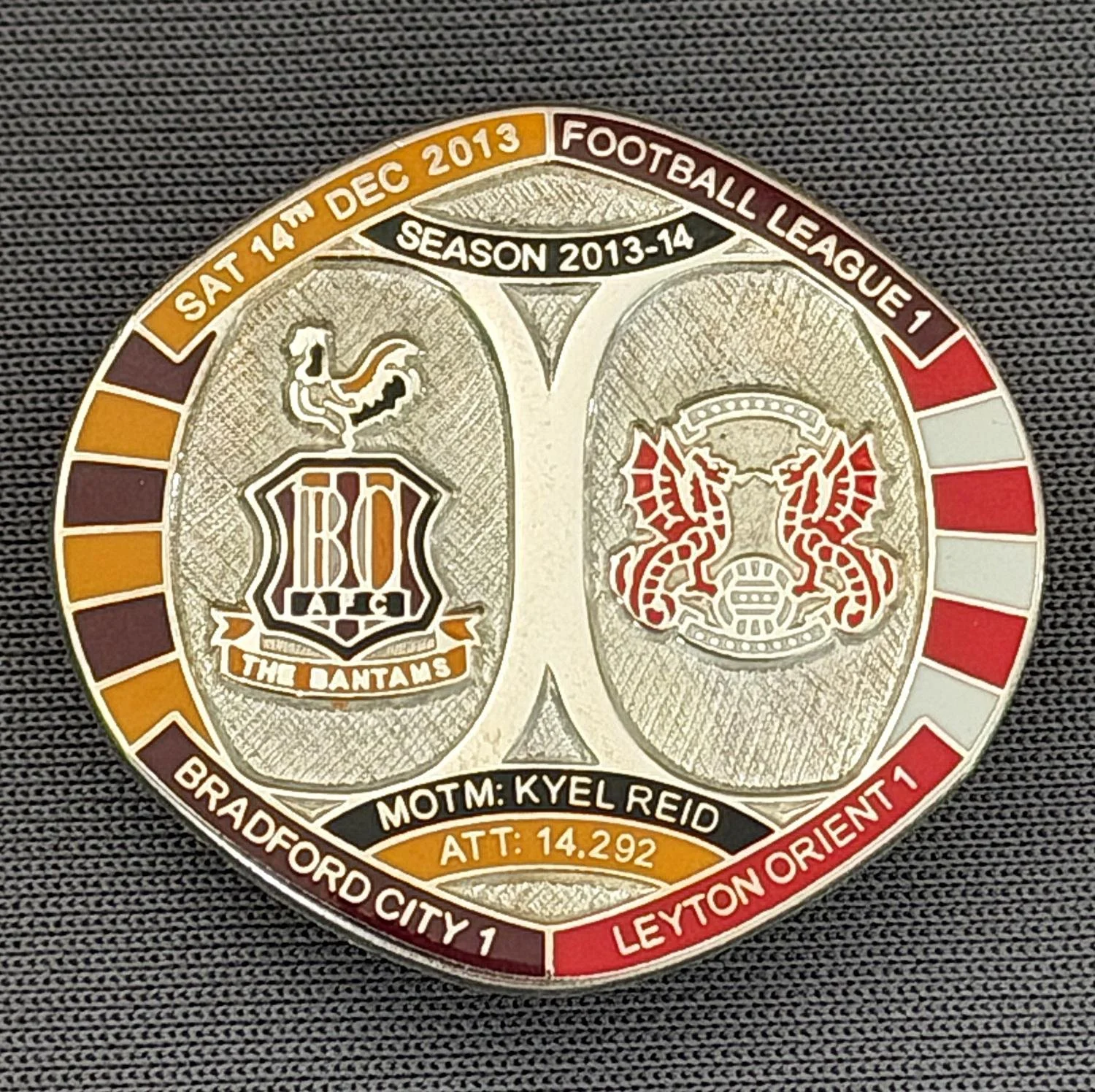 Reference Number: BCFIX217
Size: H 26.3 mm x W 28.9 mm
Pin Type: Brooch Pin
Plating: Silver
Value: £10
Manufacturer: Bradford City Badges
Comments: Bradford City v Leyton Orient  2013/14 Limited Edition 10 Badges (Silver Version)