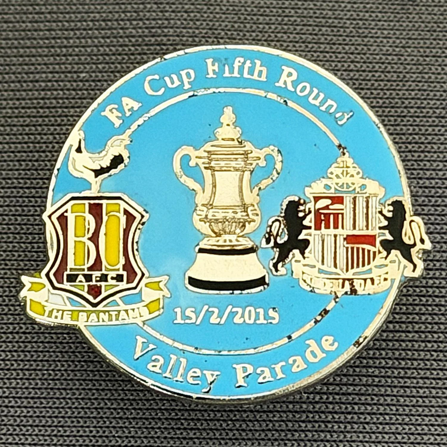 Reference Number: BCFAC107
Size: H 22.8 mm x W 25.4 mm
Pin Type: Metal Clutch
Plating: Silver
Value: £4
Manufacturer: Dan Lloyd
Comments: F.A. Cup Fifth Round 2014/15, v Sunderland, Royal Blue Version