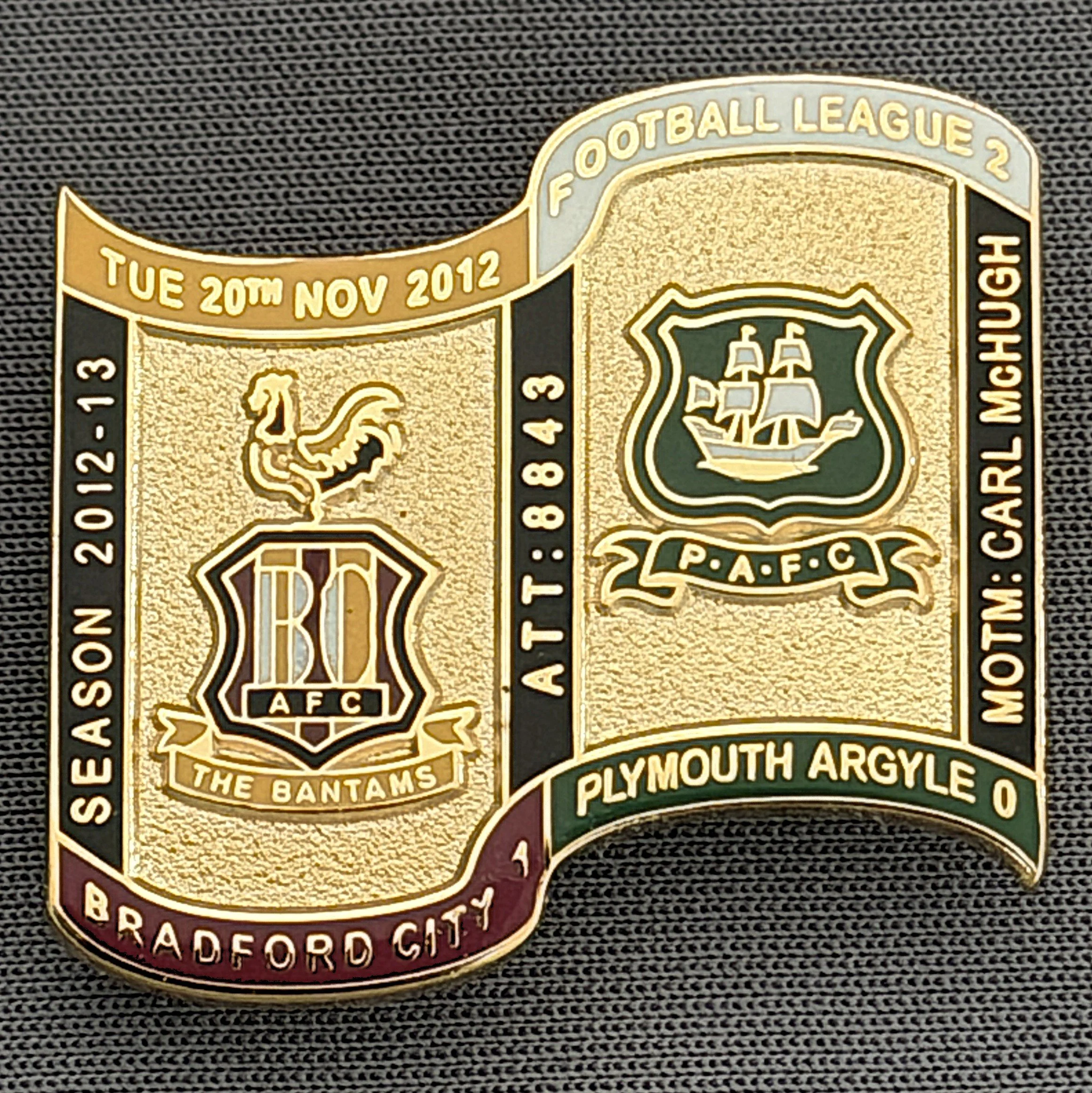 Reference Number: BCFIX125
Size: H 26.9 mm x W 29.2 mm
Pin Type: Brooch Pin
Plating: Gold
Value: £8
Manufacturer: Bradford City Badges
Comments: Bradford City v Plymouth Argyle 2012/13 Limited Edition 65 Badges
