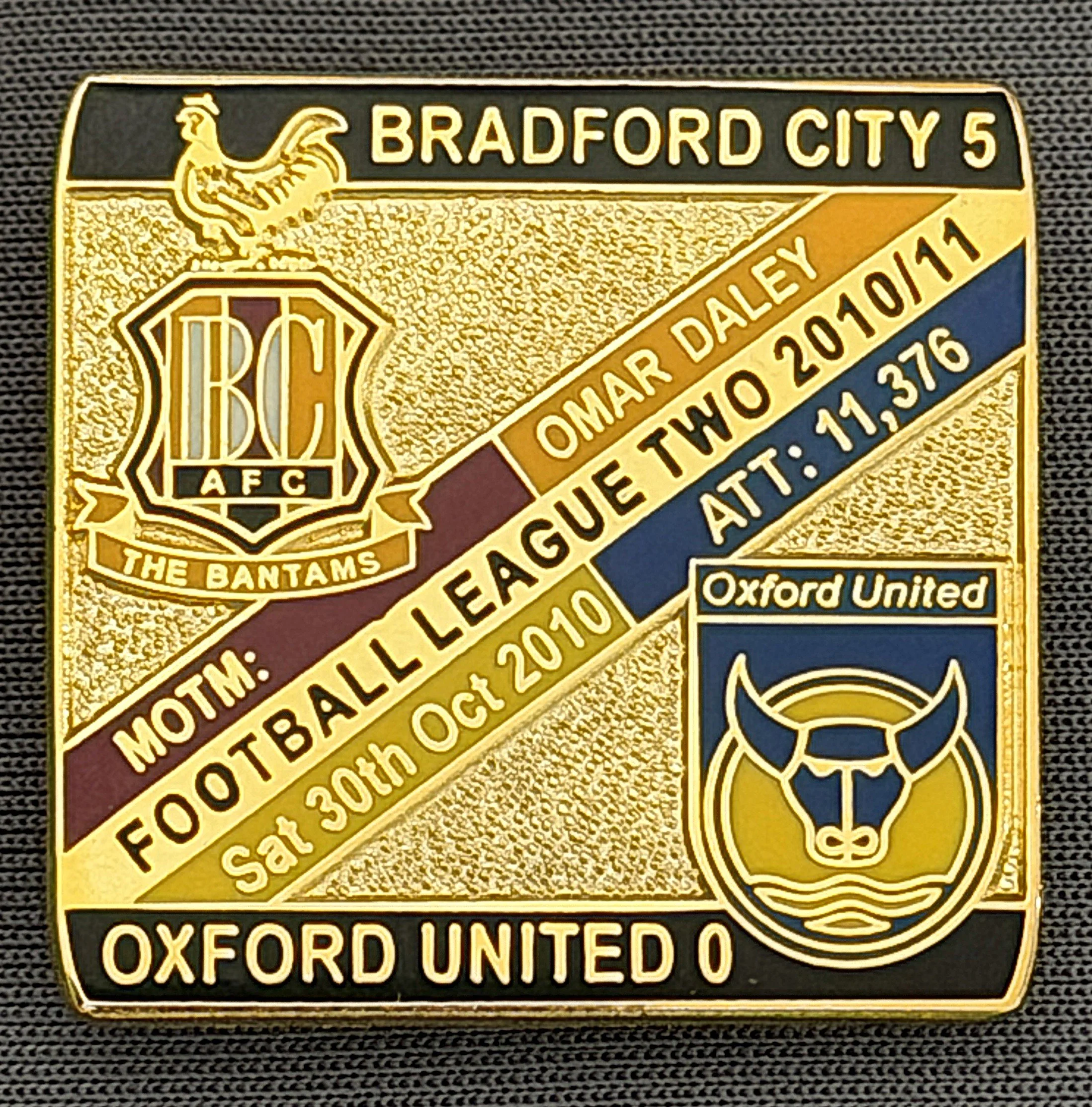 Reference Number: BCFIX053
Size: H 28.3 mm x W 29.3 mm
Pin Type: Brooch Pin
Plating: Gold
Value: £8
Manufacturer: Bradford City Badges
Comments: Bradford City v Oxford United  2010/11 Limited Edition 100 Badges