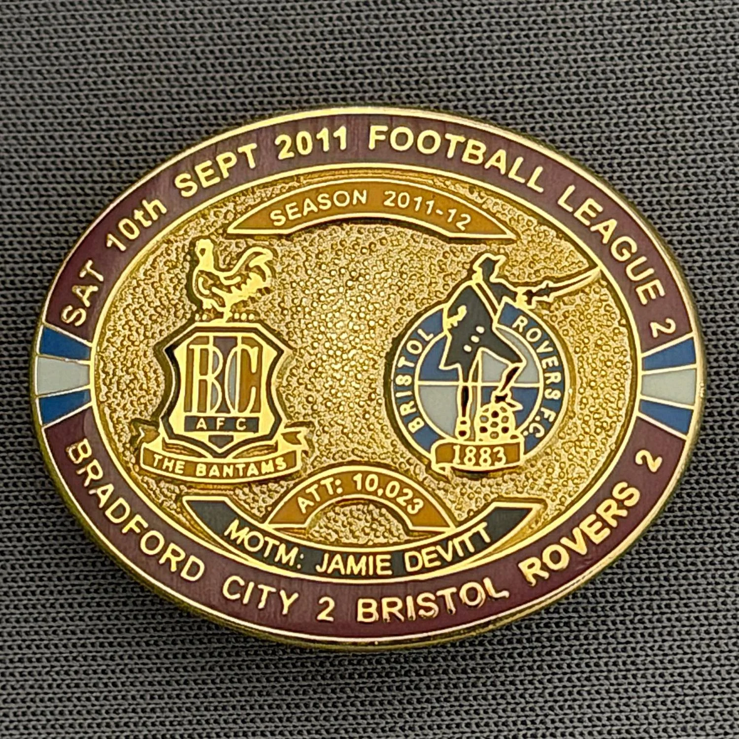 Reference Number: BCFIX073
Size: H 23.6 mm x W 28.7 mm
Pin Type: Brooch Pin
Plating: Gold
Value: £8
Manufacturer: Bradford City Badges
Comments: Bradford City v Bristol Rovers  2011/12 Limited Edition 80 Badges