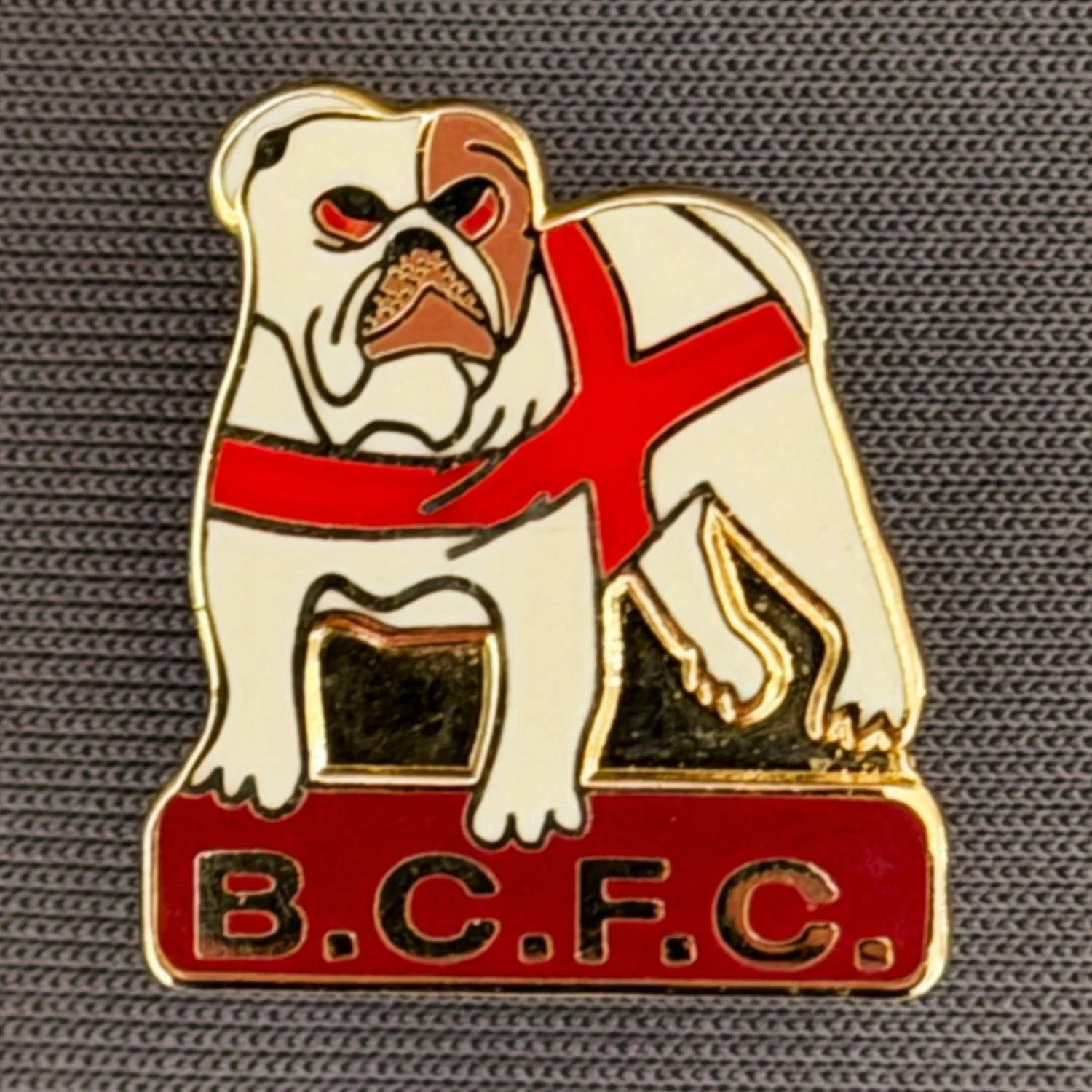 Reference Number: BCFLA028
Size: H 19 mm x W 17.5 mm
Pin Type: Metal Clutch
Plating: Gold
Value: £6
Manufacturer: Not Known
Comments: British Bulldog with St George Crest and BCFC Claret Version