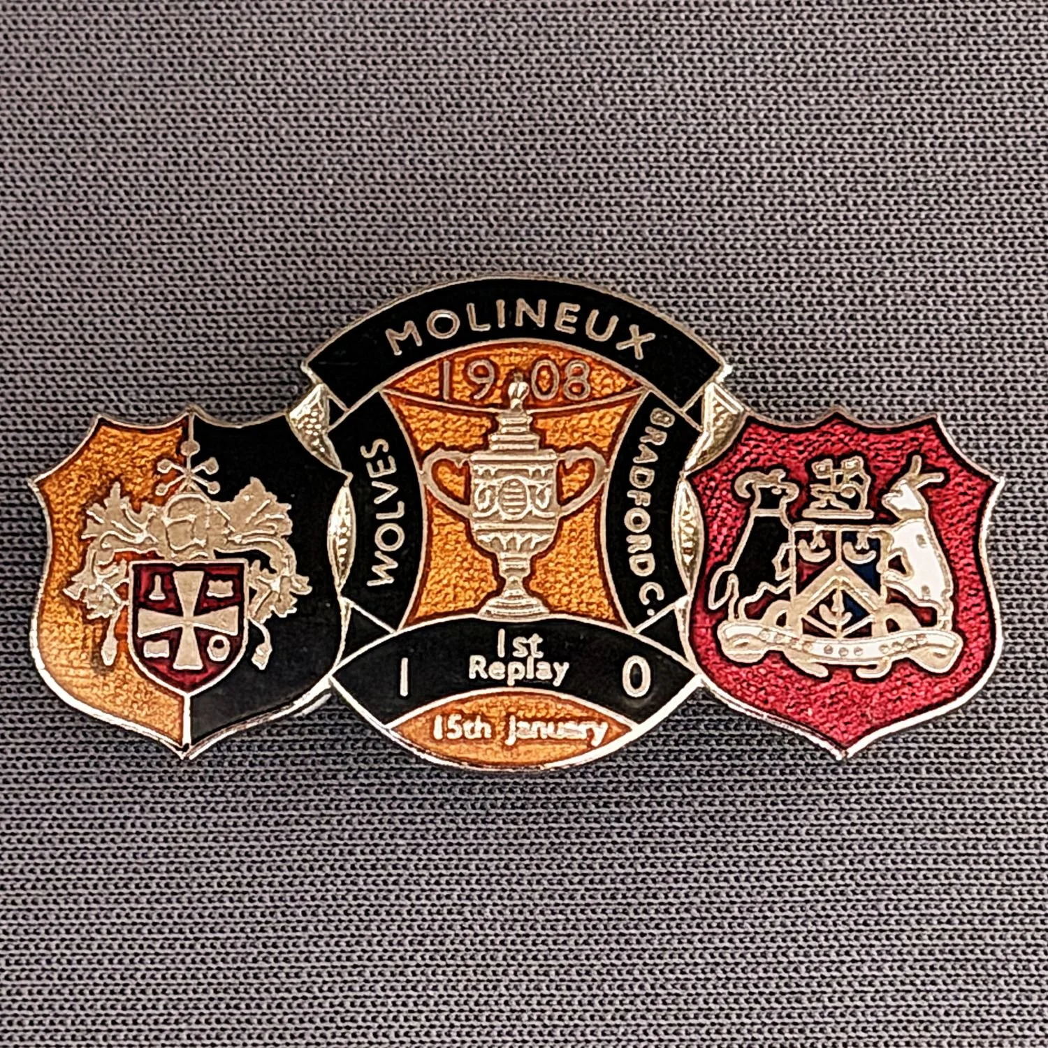 Reference Number: BCFAC158
Size: H 19.9 mm x W 37.1 mm
Pin Type: Double Metal Clutch
Plating: Silver
Value: £10
Manufacturer: AKP Designs
Comments: Wolves v Bradford City  F.A.Cup 1st Round Replay, Molineux, Black & Gold Version