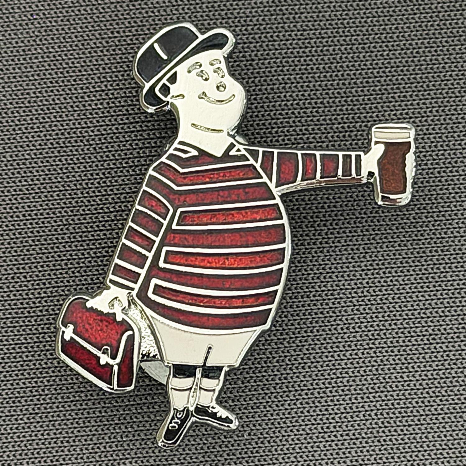 Reference Number: BCGEN062
Size: H 28.8 mm x W 20.9 mm
Pin Type: Brooch Pin
Plating: Silver
Value: £20
Manufacturer: Bradford City Badges
Comments: City Gent Beer Cloisonne, Claret Briefcase. One Off Badge.