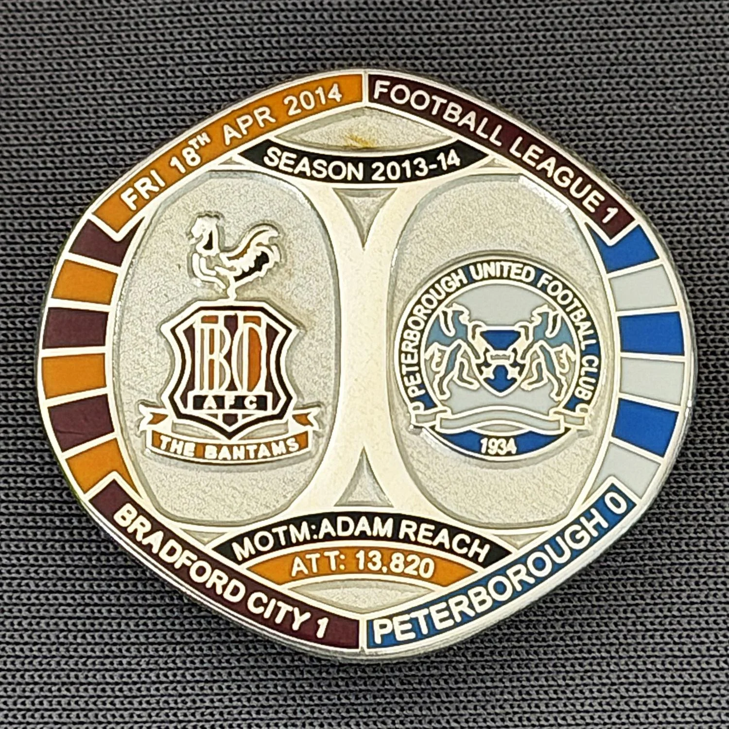 Reference Number: BCFIX229
Size: H 26.3 mm x W 28.9 mm
Pin Type: Brooch Pin
Plating: Silver
Value: £10
Manufacturer: Bradford City Badges
Comments: Bradford City v Peterborough  2013/14 Limited Edition 10 Badges (Silver Version)