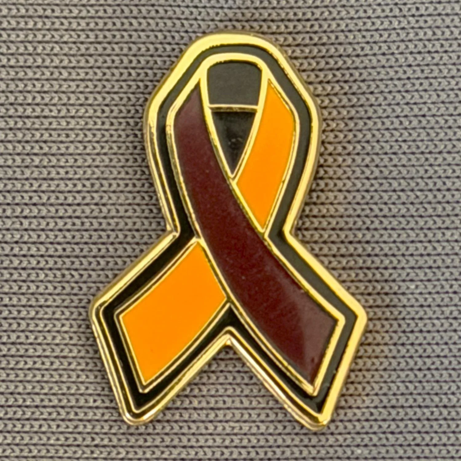 Reference Number: BCFIR018
Size: H 18.7 mm x W 13 mm
Pin Type: Metal Clutch
Plating: Gold
Value: £8
Manufacturer: Bradford City
Comments: Limited Edition of 500. Claret Amber & Black ribbon sold singularly and as part of set, to raise money for the P