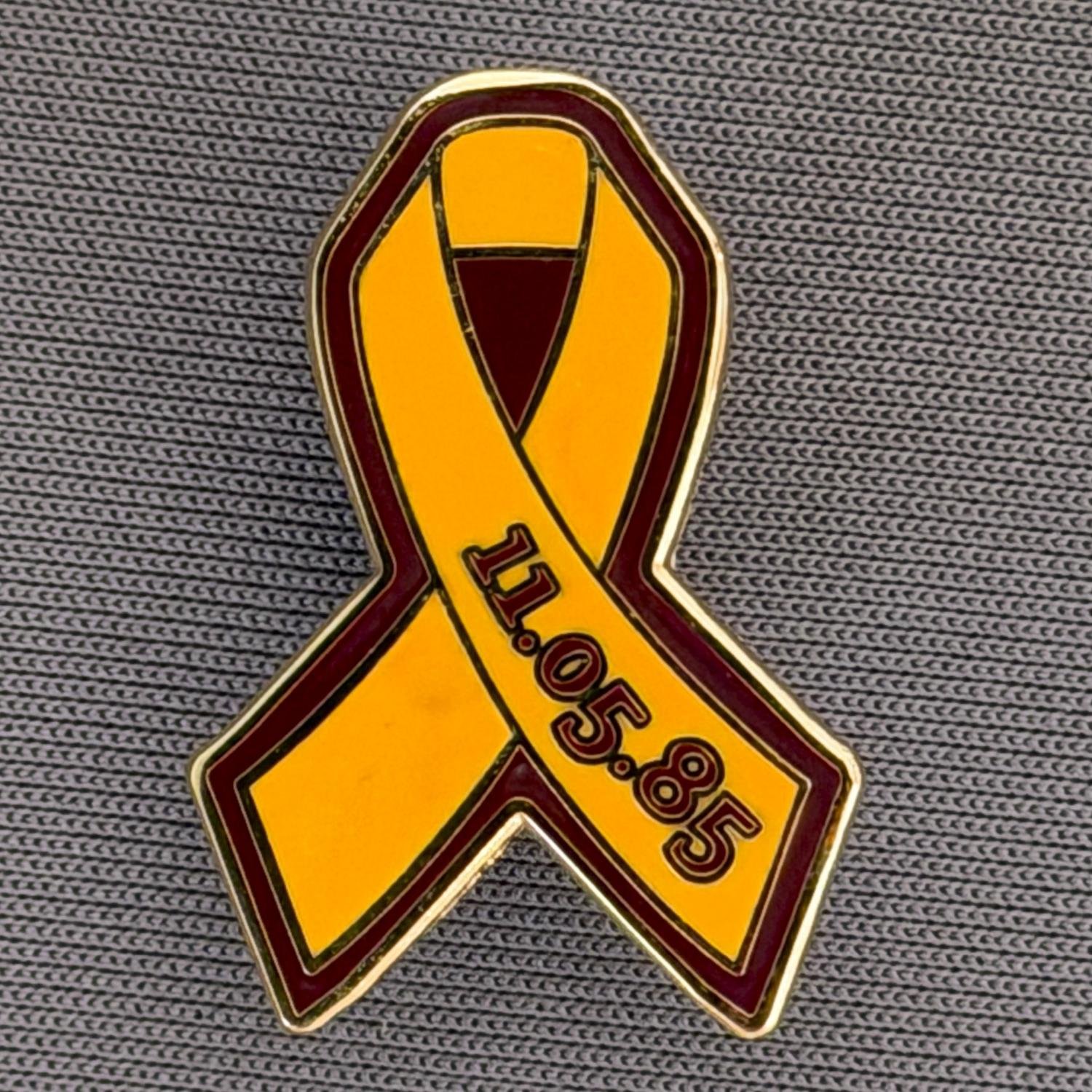 Reference Number: BCFIR016
Size: H 25.7 mm x W 17.8 mm
Pin Type: Metal Clutch
Plating: Gold
Value: £10
Manufacturer: Friends of Bradford City
Comments: Limited Edition of 50, Amber & Claret ribbon, to raise money for the PSBRU.