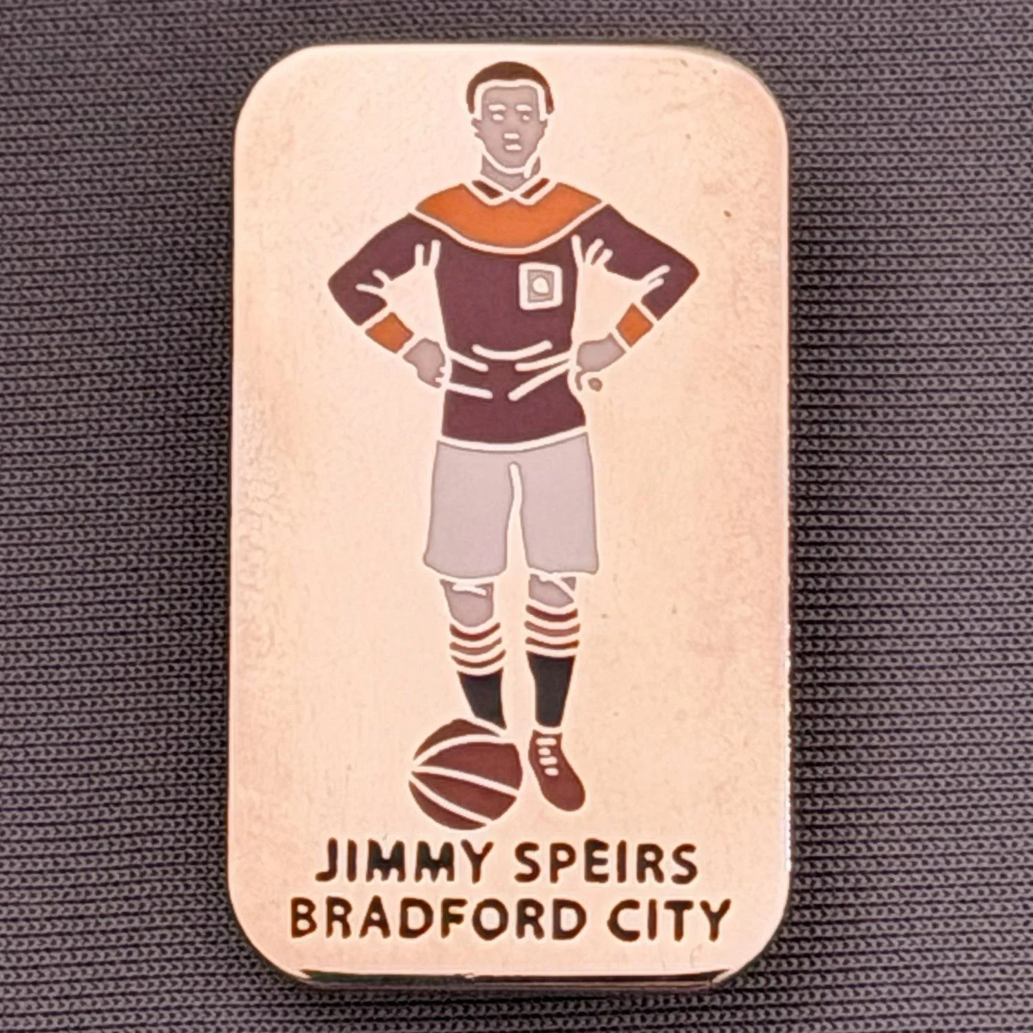 Reference Number: BCUN010
Size: H 35.2 mm x W 20.4 mm
Pin Type: Brooch Pin
Plating: Silver
Value: £6
Manufacturer: Paraders
Comments: Jimmy Speirs Bradford City