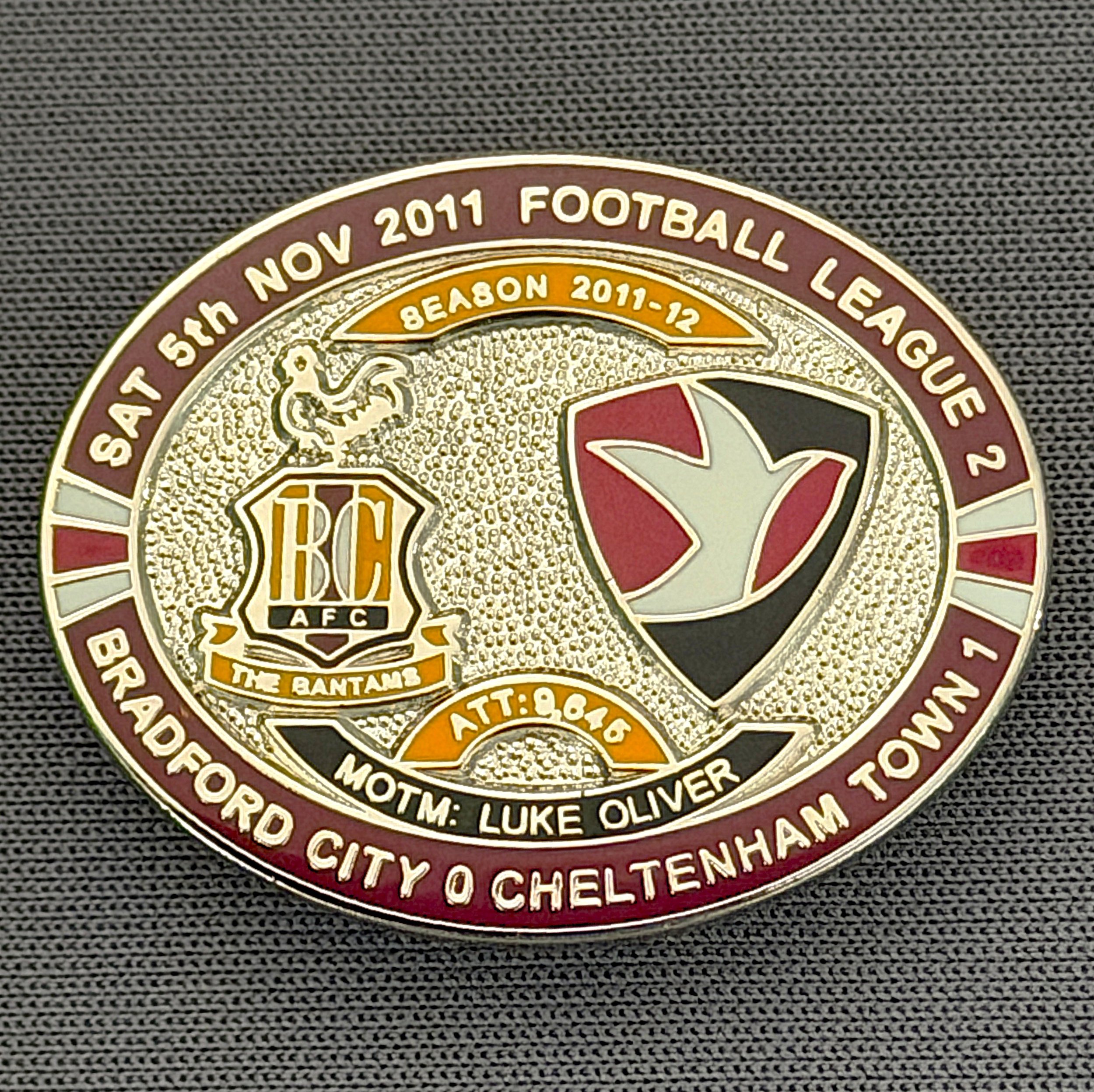Reference Number: BCFIX100
Size: H 23.6 mm x W 28.7 mm
Pin Type: Brooch Pin
Plating: Silver
Value: £10
Manufacturer: Bradford City Badges
Comments: Bradford City v Cheltenham Town  2011/12 Limited Edition 20 Badges (Silver Version)