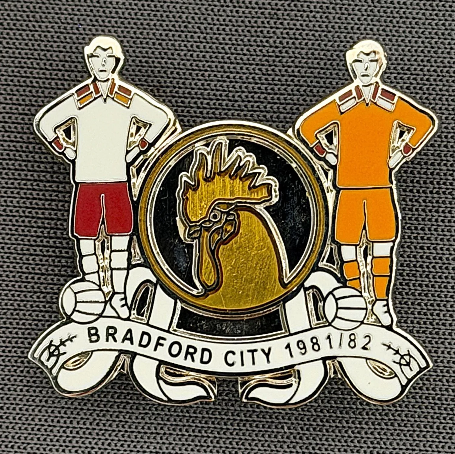 Reference Number: BCEVE056
Size: H 23 mm x W 25.2 mm
Pin Type: Brooch Pin
Plating: Silver
Value: £8
Manufacturer: Paraders
Comments: Bradford City 1981/82