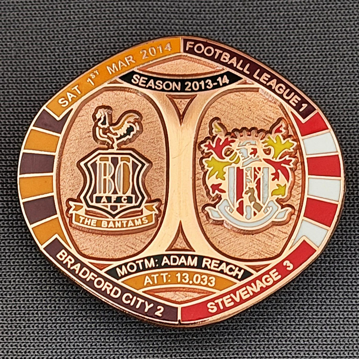 Reference Number: BCFIX248
Size: H 26.3 mm x W 28.9 mm
Pin Type: Brooch Pin
Plating: Copper
Value: £12
Manufacturer: Bradford City Badges
Comments: Bradford City v Stevenage 2013/14 Limited Edition of 1 Badge (Copper Version)