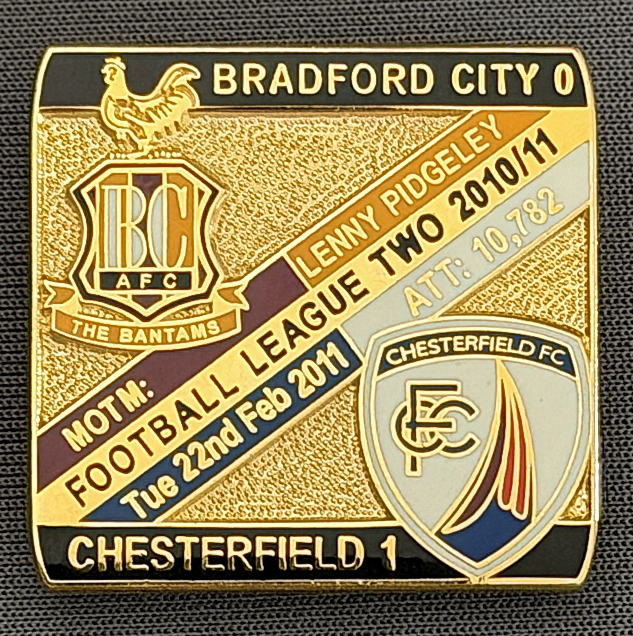 Reference Number: BCFIX061
Size: H 28.3 mm x W 29.3 mm
Pin Type: Brooch Pin
Plating: Gold
Value: £8
Manufacturer: Bradford City Badges
Comments: Bradford City v Chesterfield  2010/11 Limited Edition 100 Badges