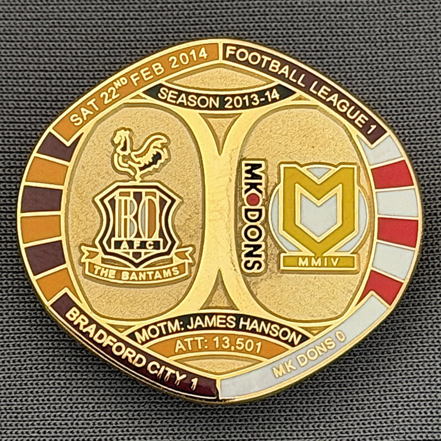 Reference Number: BCFIX201
Size: H 26.3 mm x W 28.9 mm
Pin Type: Brooch Pin
Plating: Gold
Value: £8
Manufacturer: Bradford City Badges
Comments: Bradford City v M.K. Dons 2013/14 Limited Edition 55 Badges