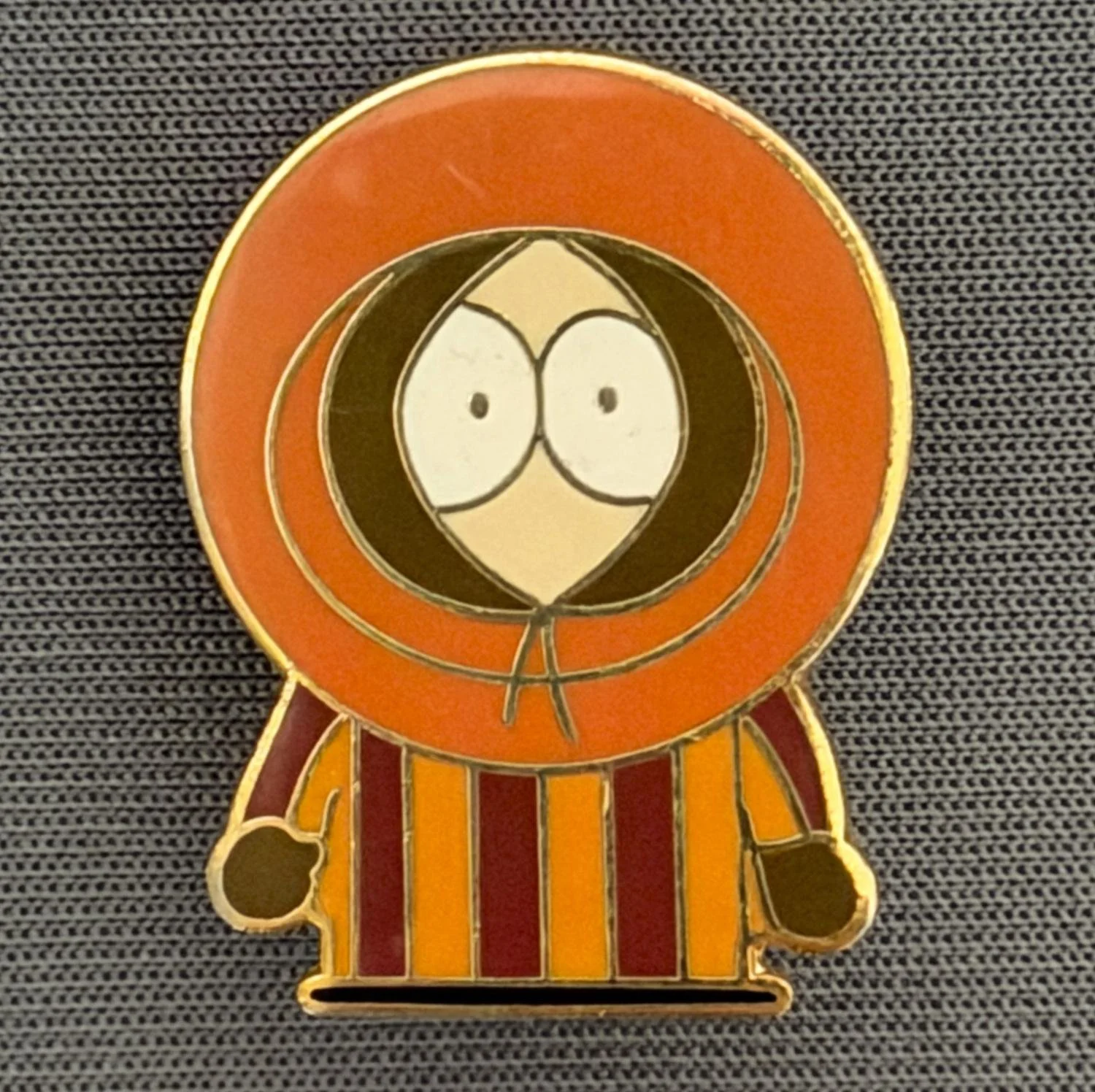 Reference Number: BCCTN014
Size: H 24.8 mm x W 18.8 mm
Pin Type: Brooch Pin
Plating: Gold
Value: £6
Manufacturer: Not Known
Comments: Kenny Mccormick South Park in Bradford City Kit