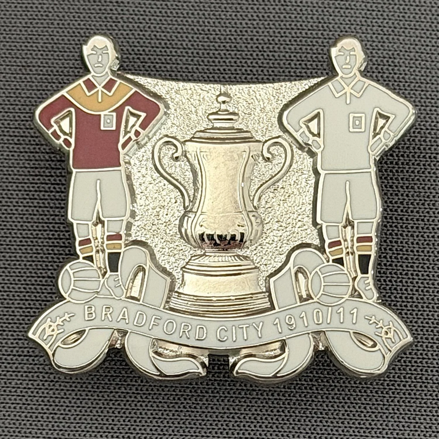 Reference Number: BCEVE036
Size: H 26 mm x W 28.2 mm
Pin Type: Brooch Pin
Plating: Silver
Value: £8
Manufacturer: Paraders
Comments: Bradford City F.A. Cup Winners 1910/11