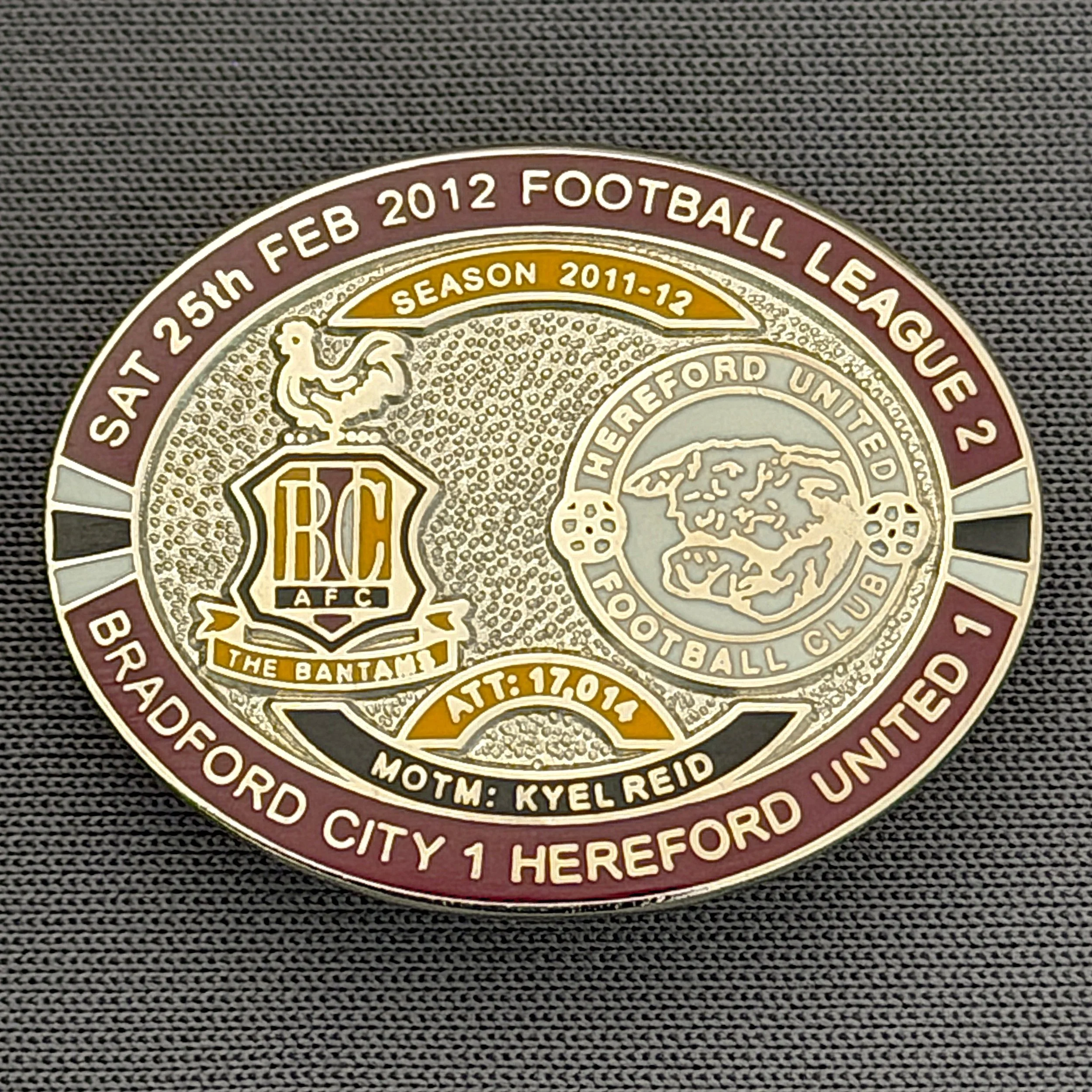 Reference Number: BCFIX108
Size: H 23.6 mm x W 28.7 mm
Pin Type: Brooch Pin
Plating: Silver
Value: £10
Manufacturer: Bradford City Badges
Comments: Bradford City v Hereford United 2011/12 Limited Edition 20 Badges (Silver Version)