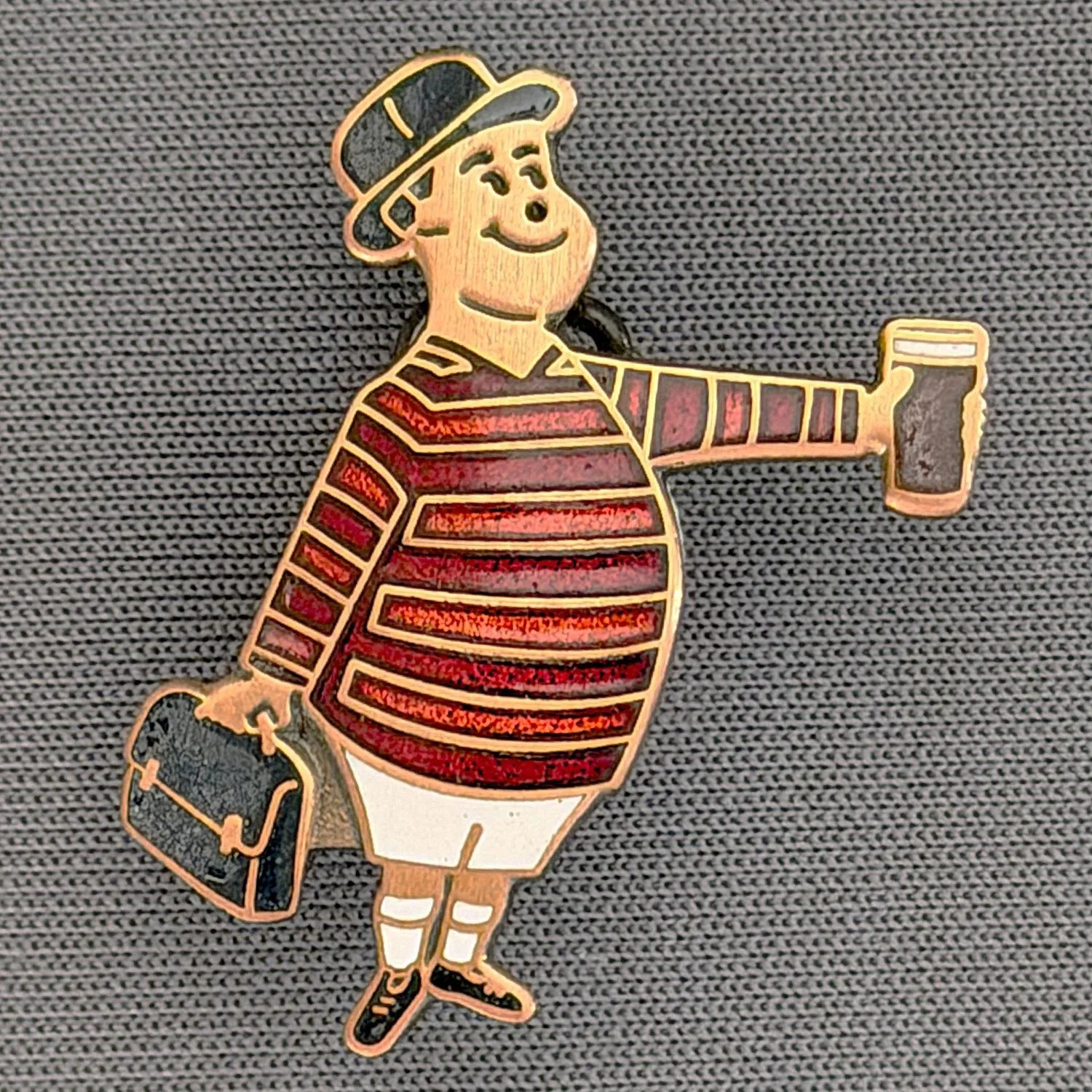 Reference Number: BCGEN071
Size: H 28.8 mm x W 20.9 mm
Pin Type: Brooch Pin
Plating: Antique Gold
Value: £20
Manufacturer: Bradford City Badges
Comments: City Gent Beer Cloisonne, Black Briefcase. One Off Badge.