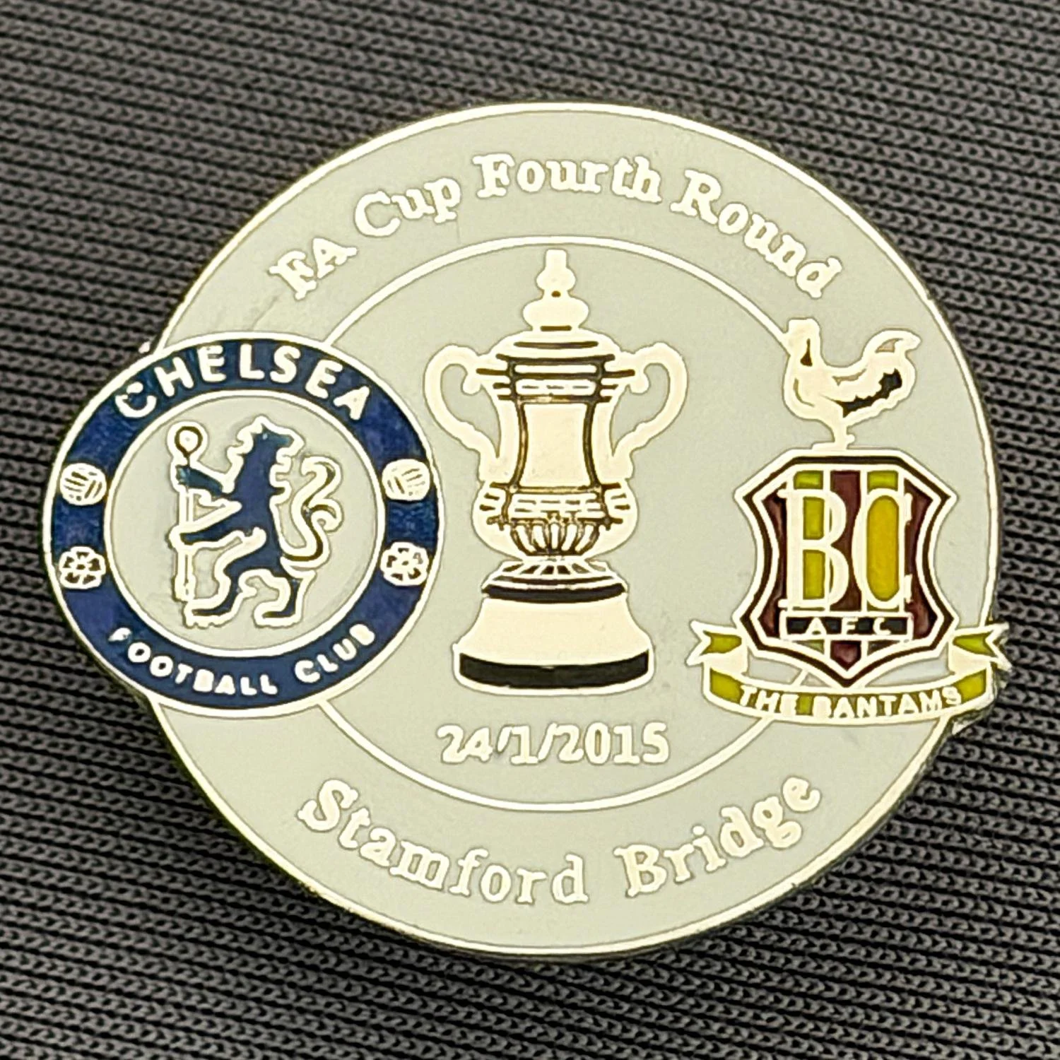 Reference Number: BCFAC092
Size: H 23.3 mm x W 25.3 mm
Pin Type: Metal Clutch
Plating: Silver
Value: £4
Manufacturer: Dan Lloyd
Comments: F.A. Cup Fourth Round 2014/15, Away v Chelsea, White Version